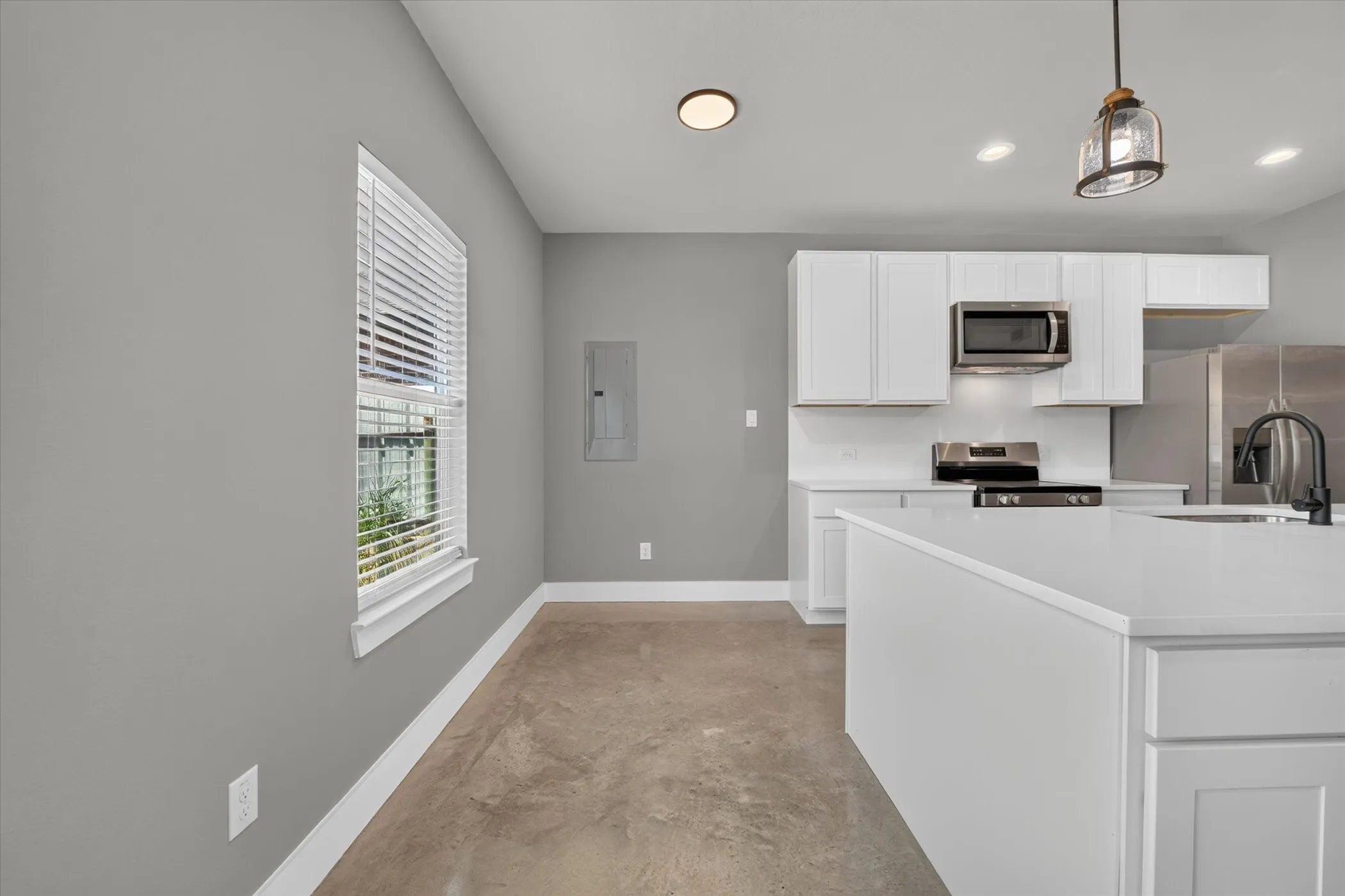 Breakfast nook area by kitchen.