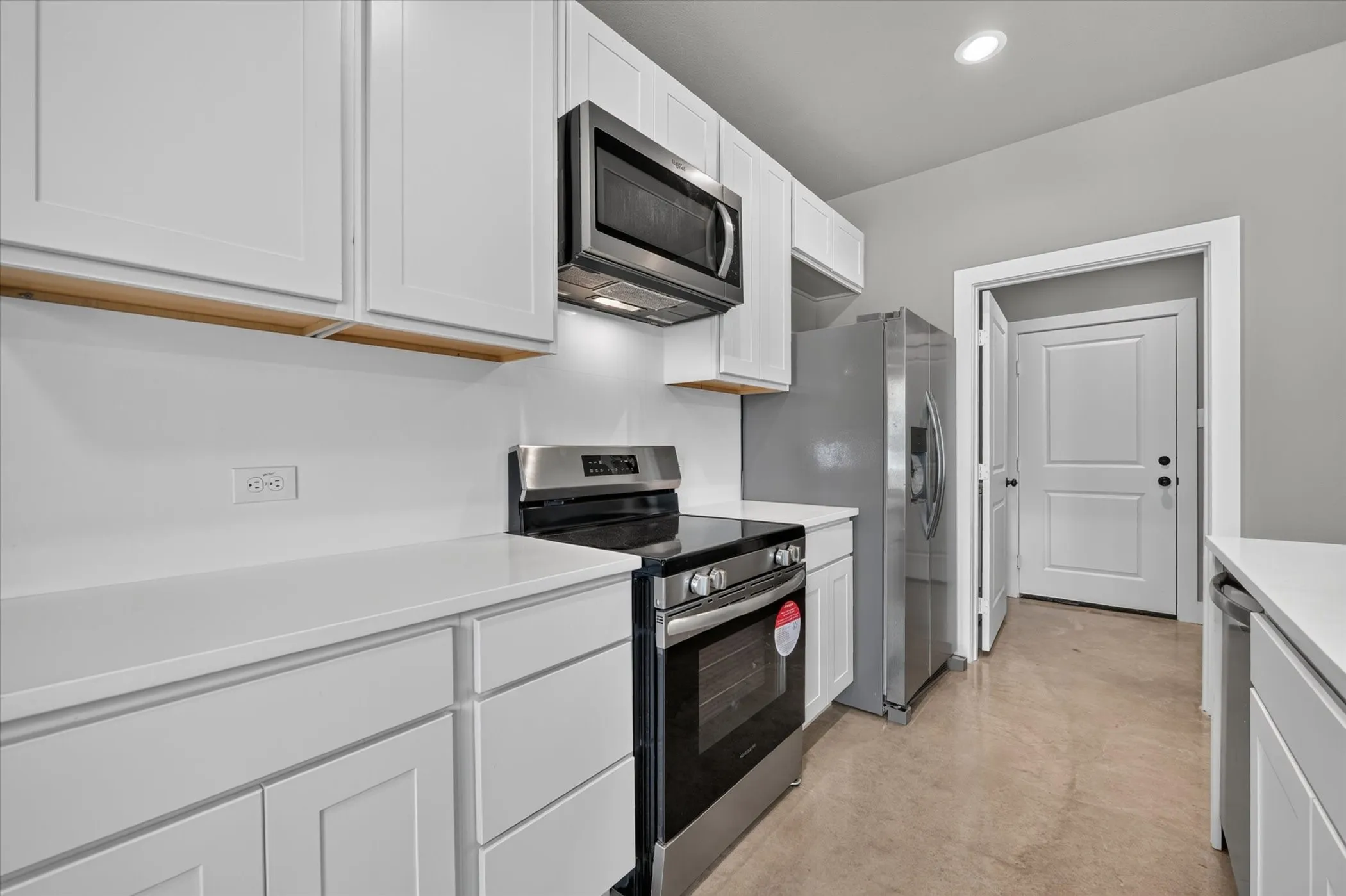 All new kitchen cabinets and appliances.