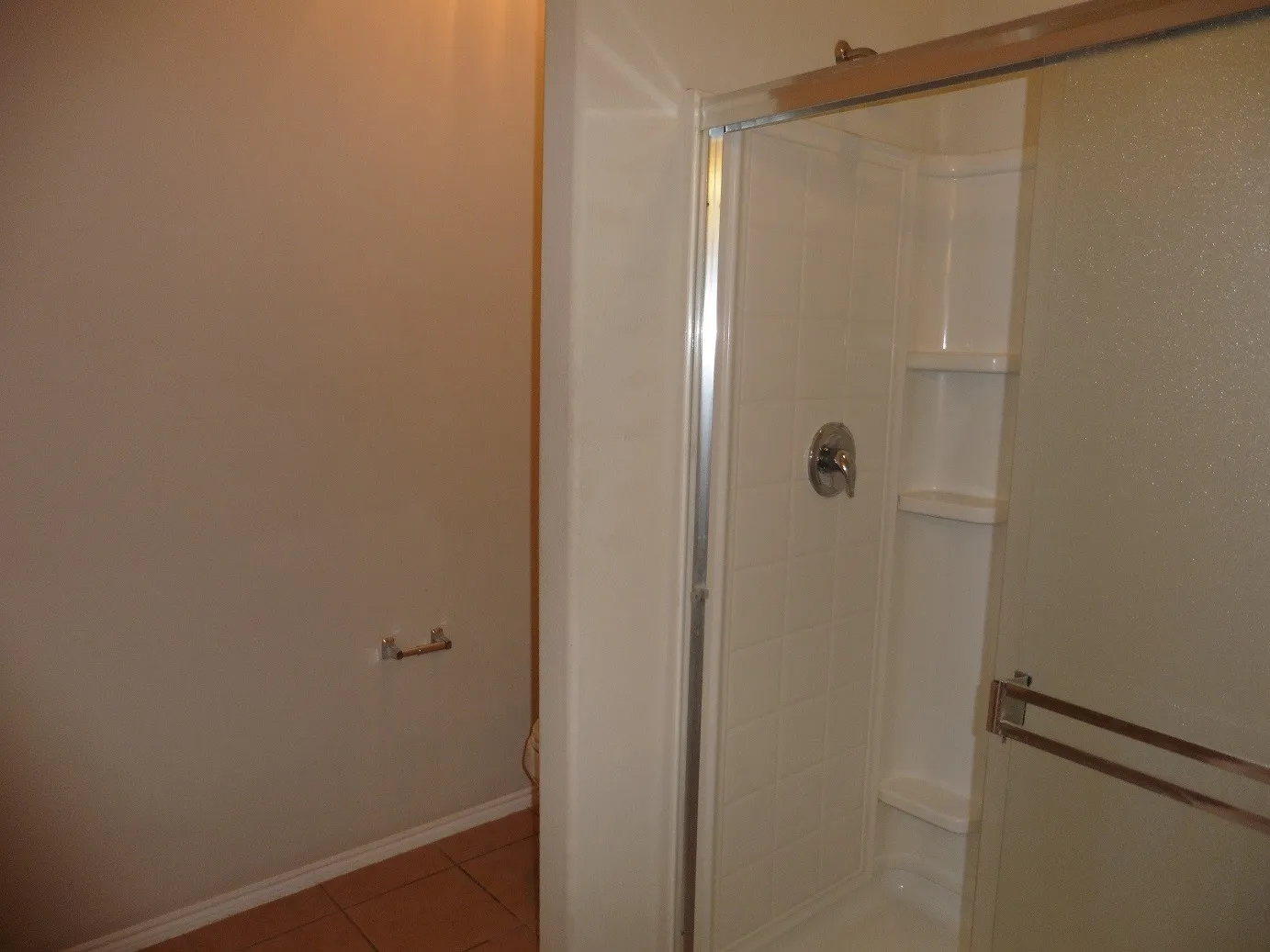 Owner's Ensuite bath features dual sink vanity with makeup desk, garden tub, separate double shower with walk-in closet, neutral wall tones, and crown molding.