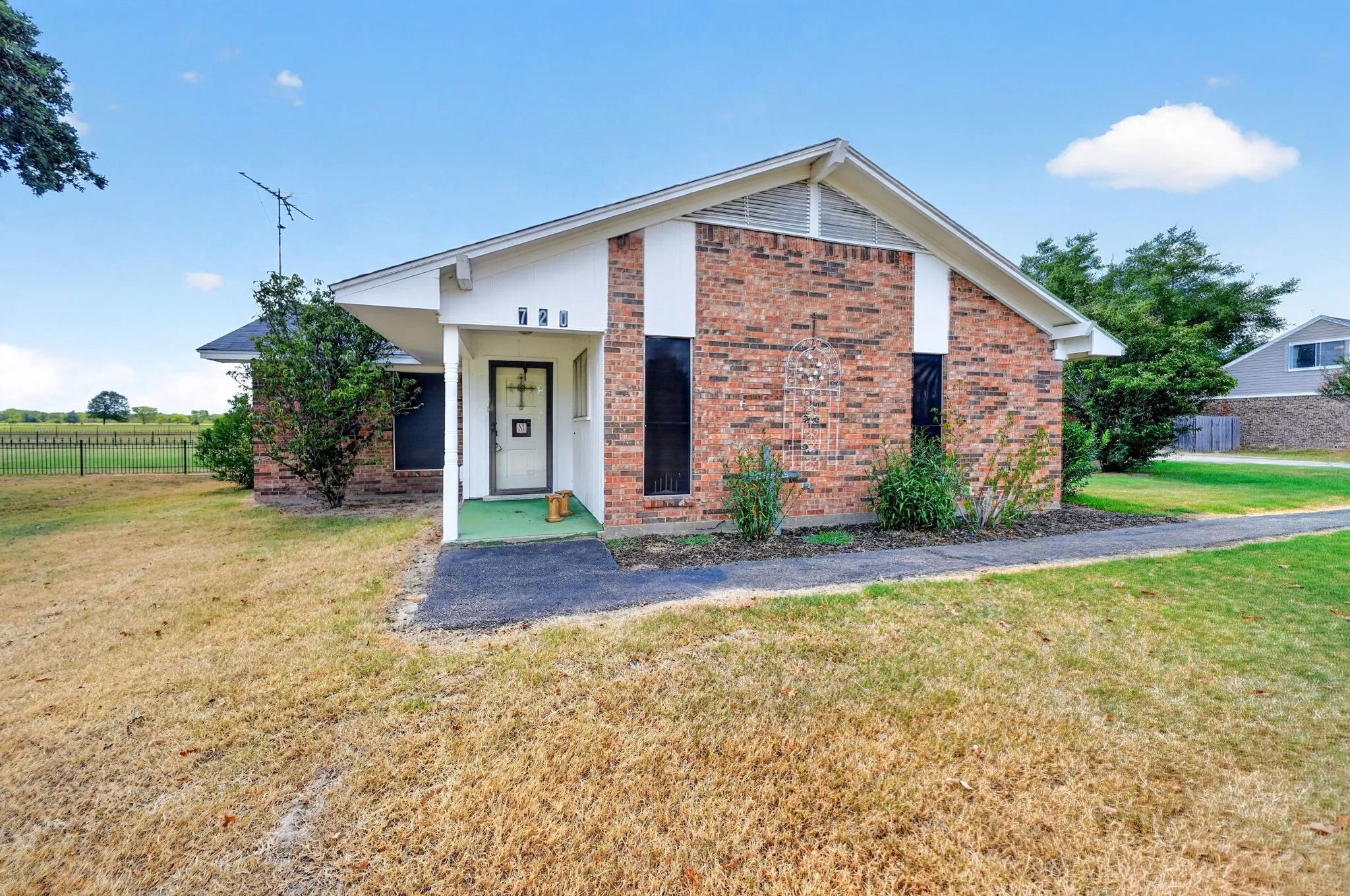 Brick facade with white trim