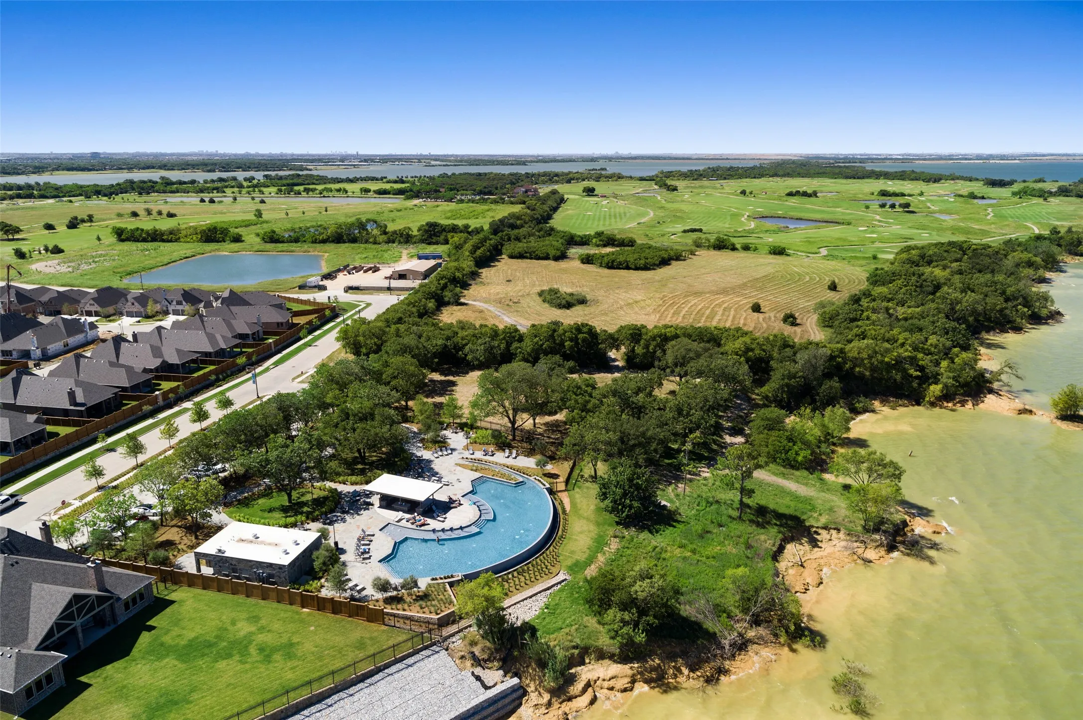 Experience championship golf at The Tribute, home to two award-winning courses set against the breathtaking backdrop of Lake Lewisville. Residents also enjoy a beautiful clubhouse featuring a full-service restaurant, live music, social events, and year-round entertainment, creating a true resort-style lifestyle both on and off the course.
