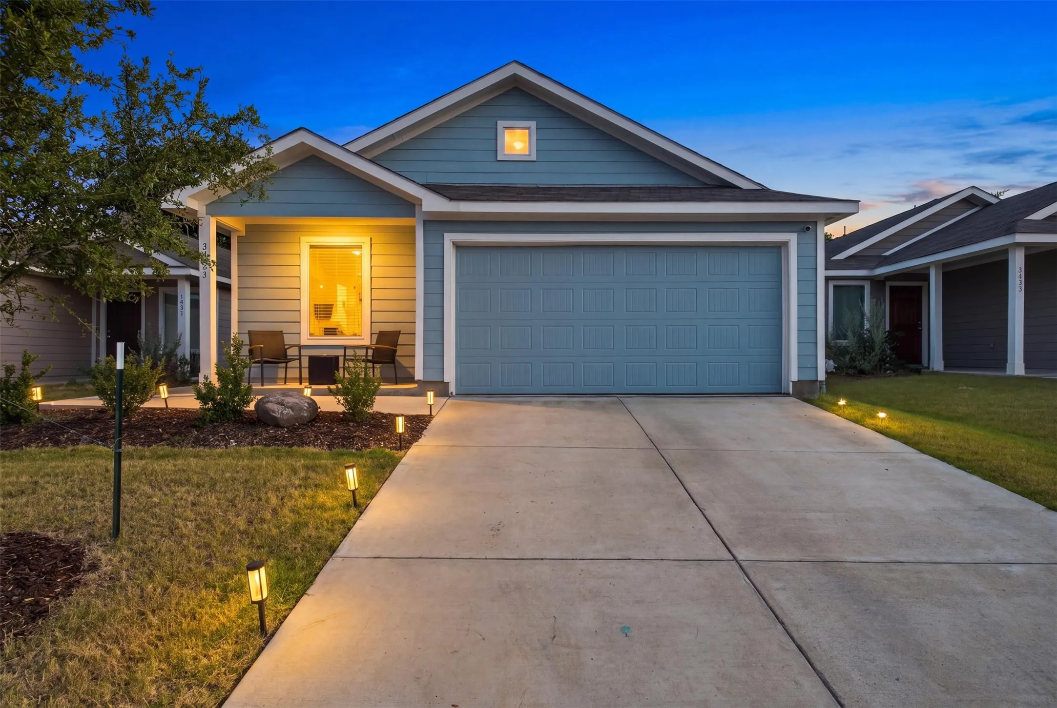 Light blue siding exterior with white trim