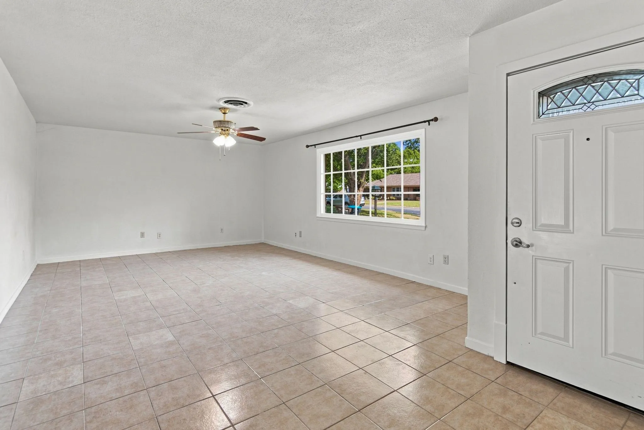 Another view of Living Room and Front Door.