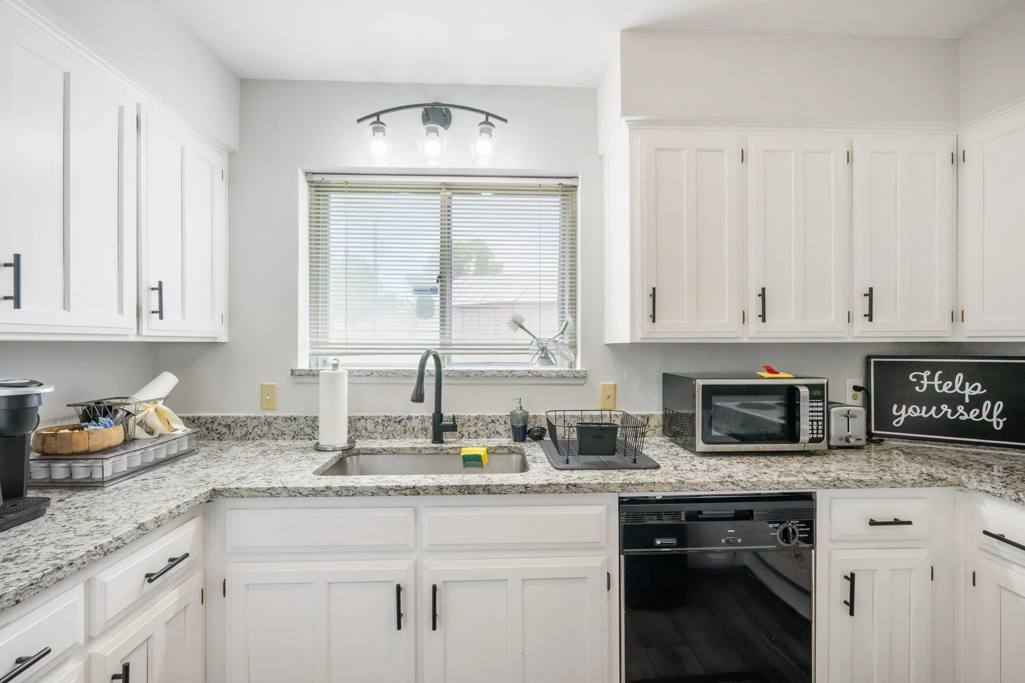 Kitchen features a good amount of storage.