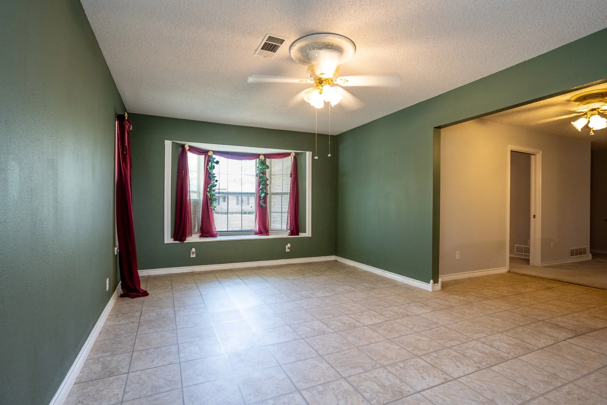 Wide opening gives access to kitchen and living areas.