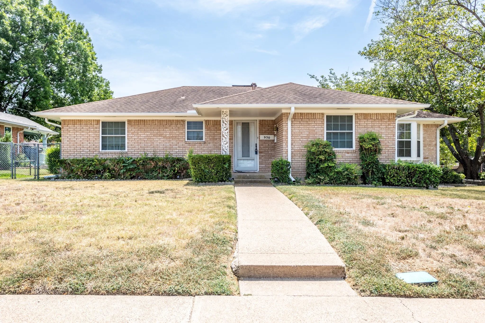Built in 1964 home has been updated with new windows and had additions. There are some trees on the west side and a sprinkler system.