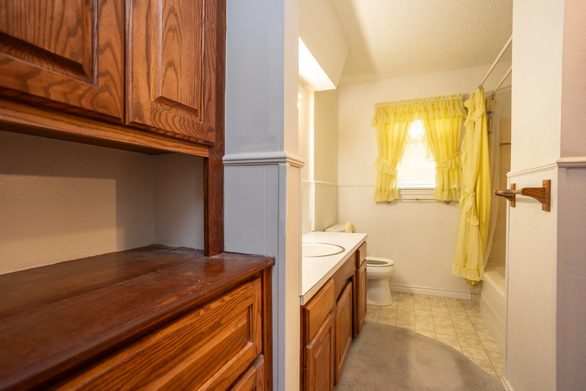 Hollywood bath opens off the hall as well as the master bedroom