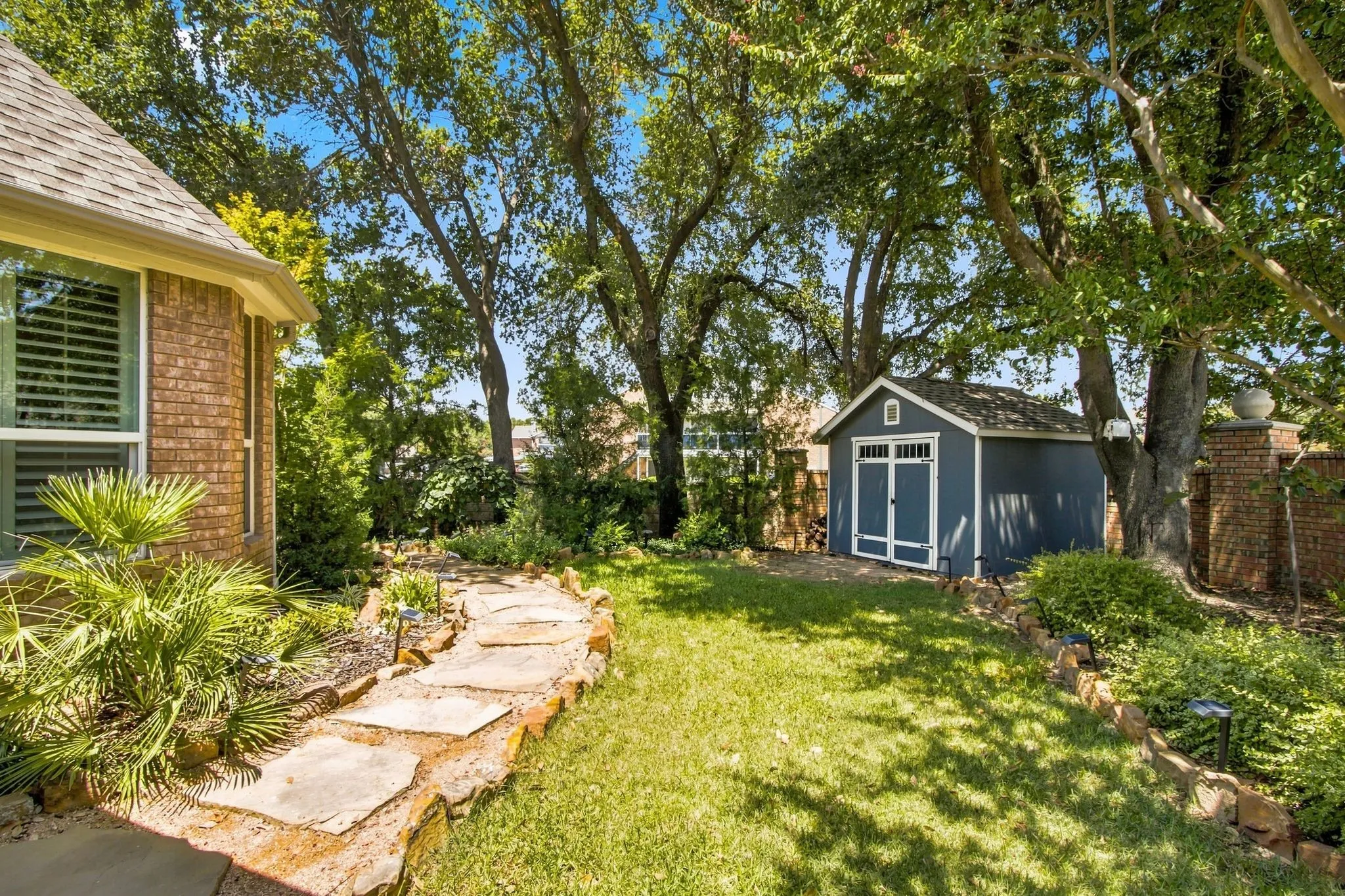 Flagstone path and beautiful landscaping.
