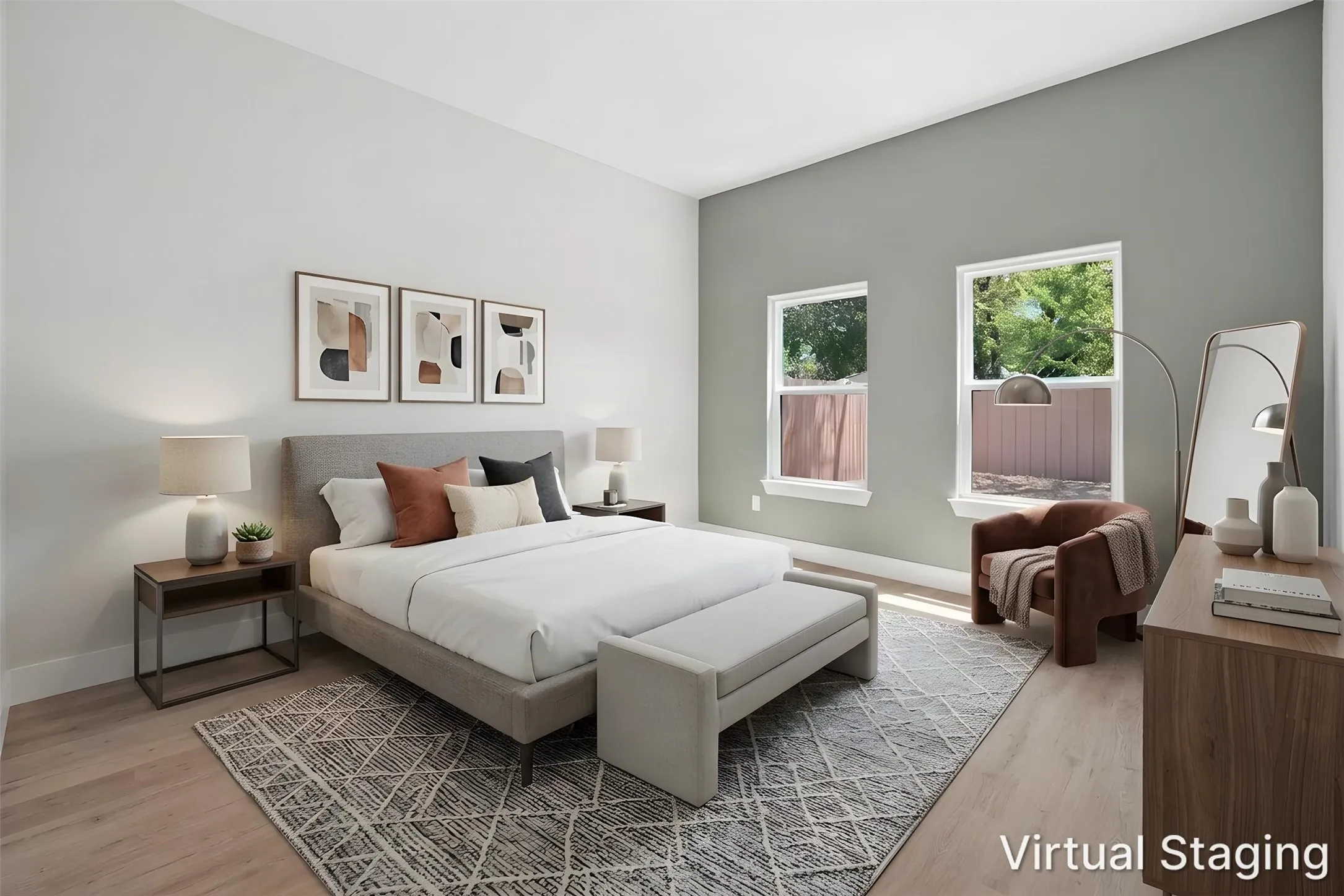 Vaulted ceiling, two windows, wood-finish flooring, two-tone wall paint, built-in dresser