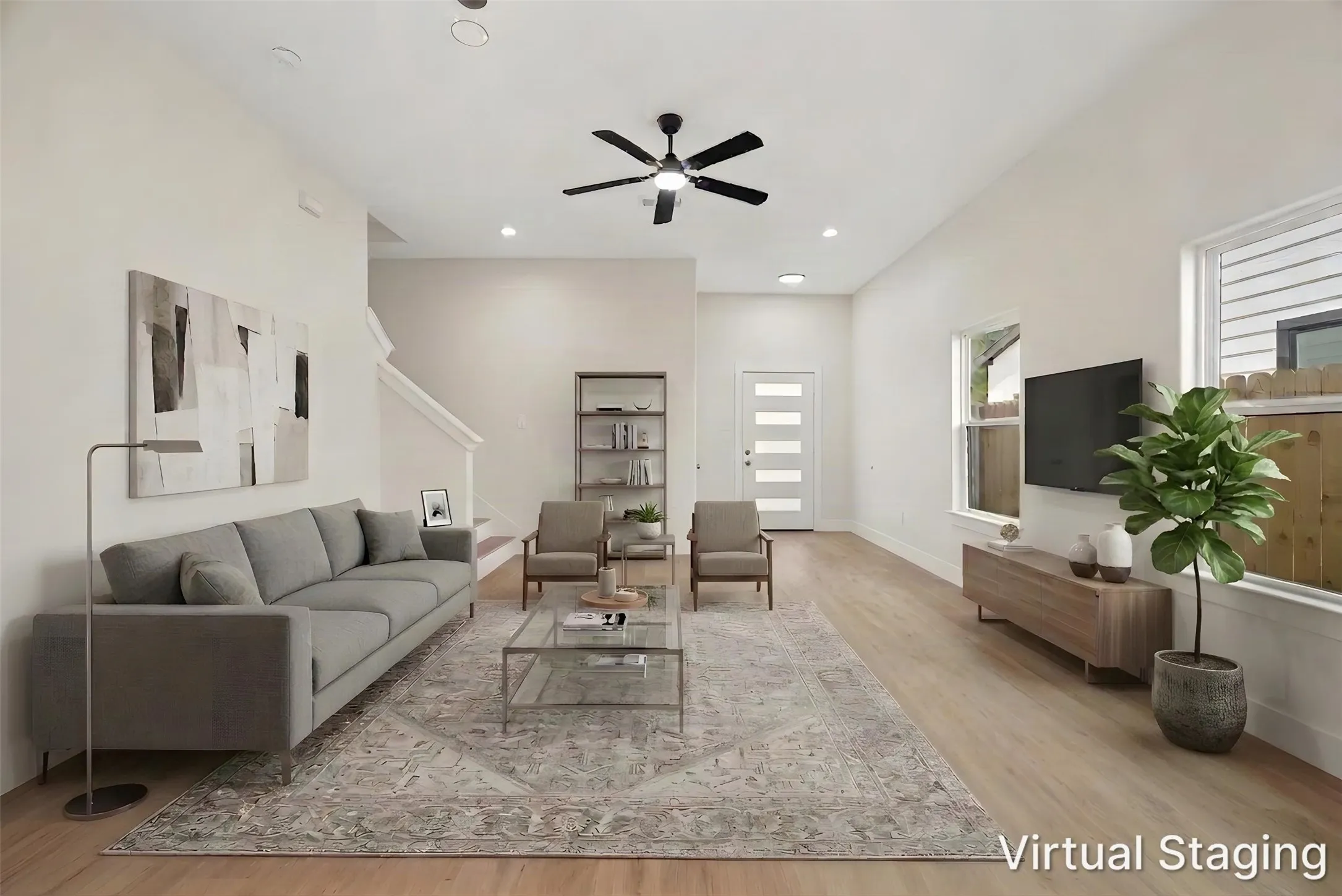 Vaulted ceiling with recessed lighting and a ceiling fan, wood-finish flooring, and white walls