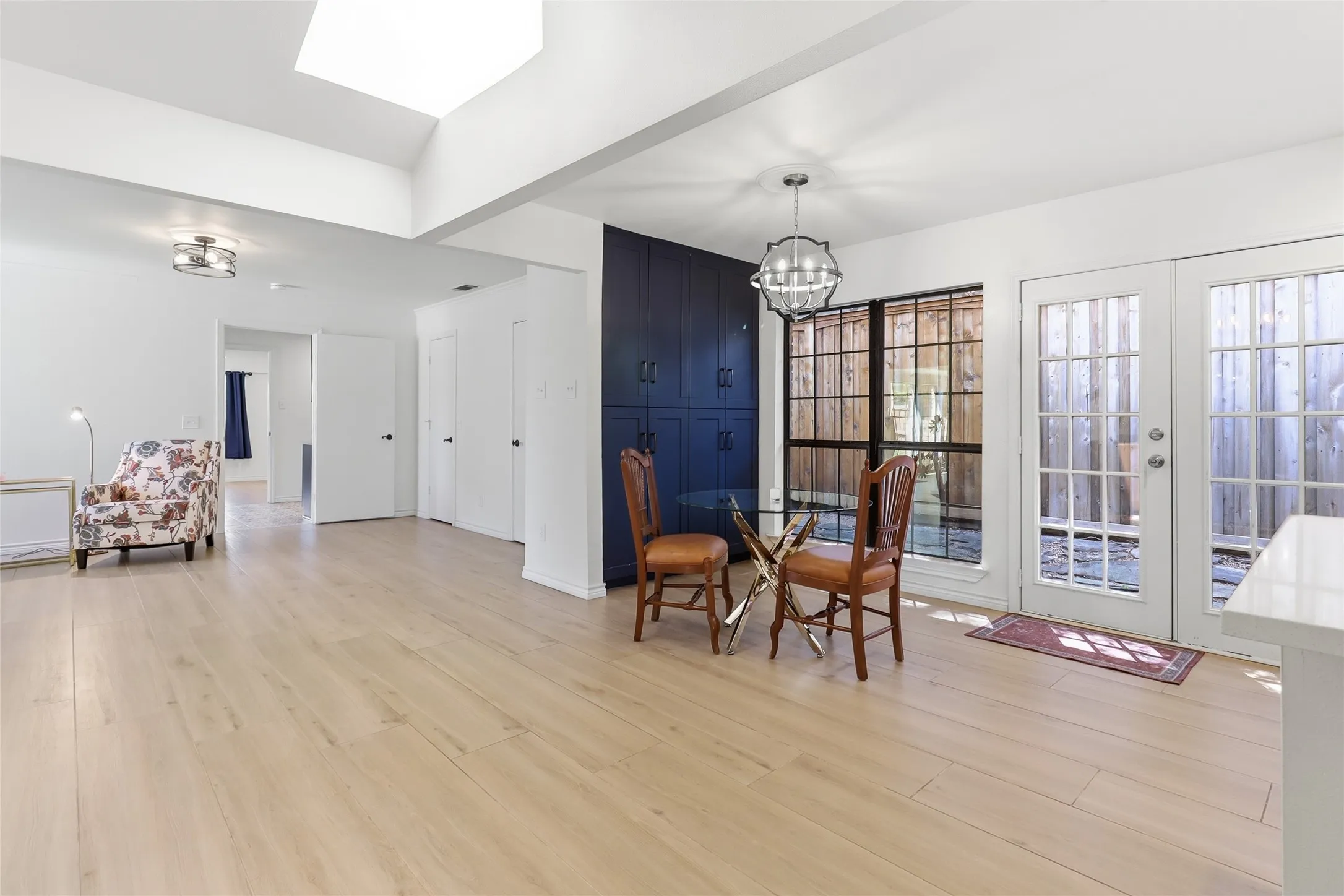 'Small breakfast nook, leading out to a side yard.