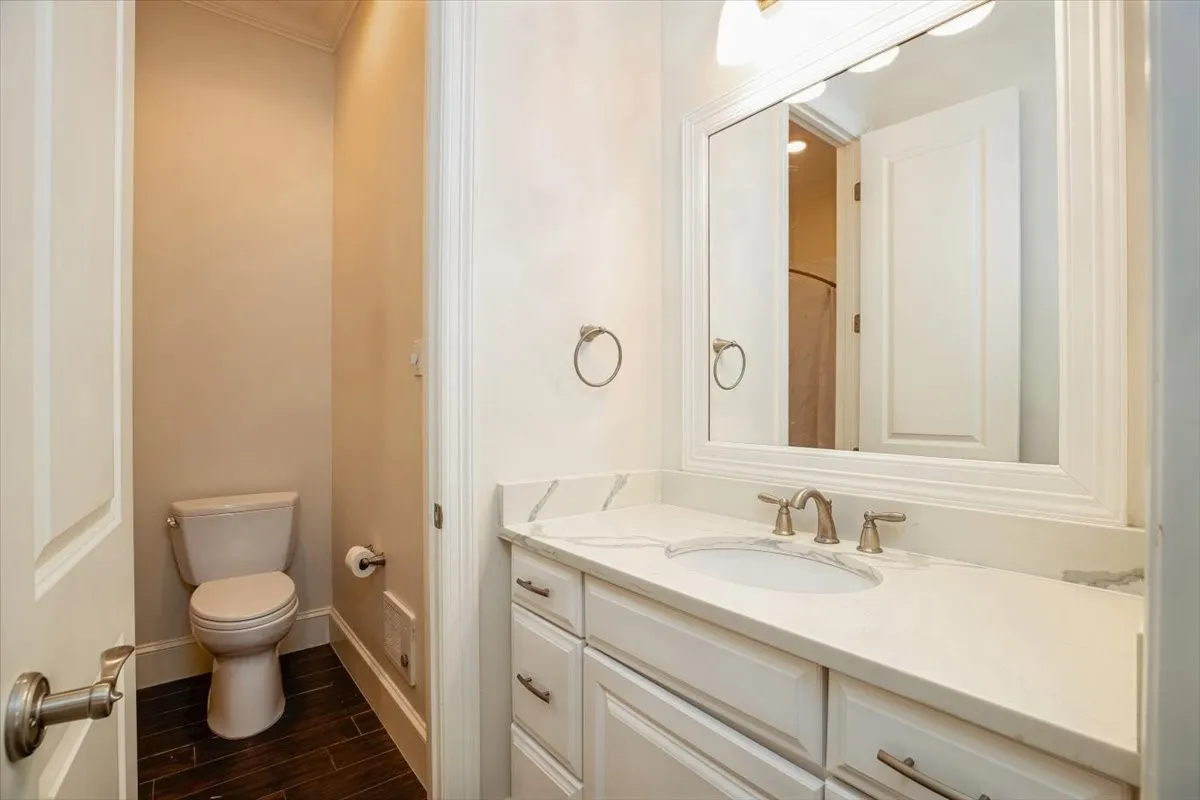 Jack and Jill Bathroom Vanity with undermount sink, stone finish countertop, and brushed nickel fixtures