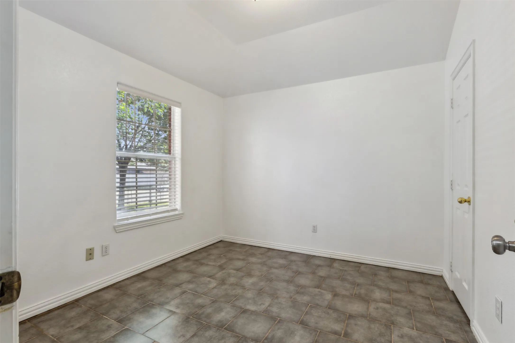 View of tiled spare room
