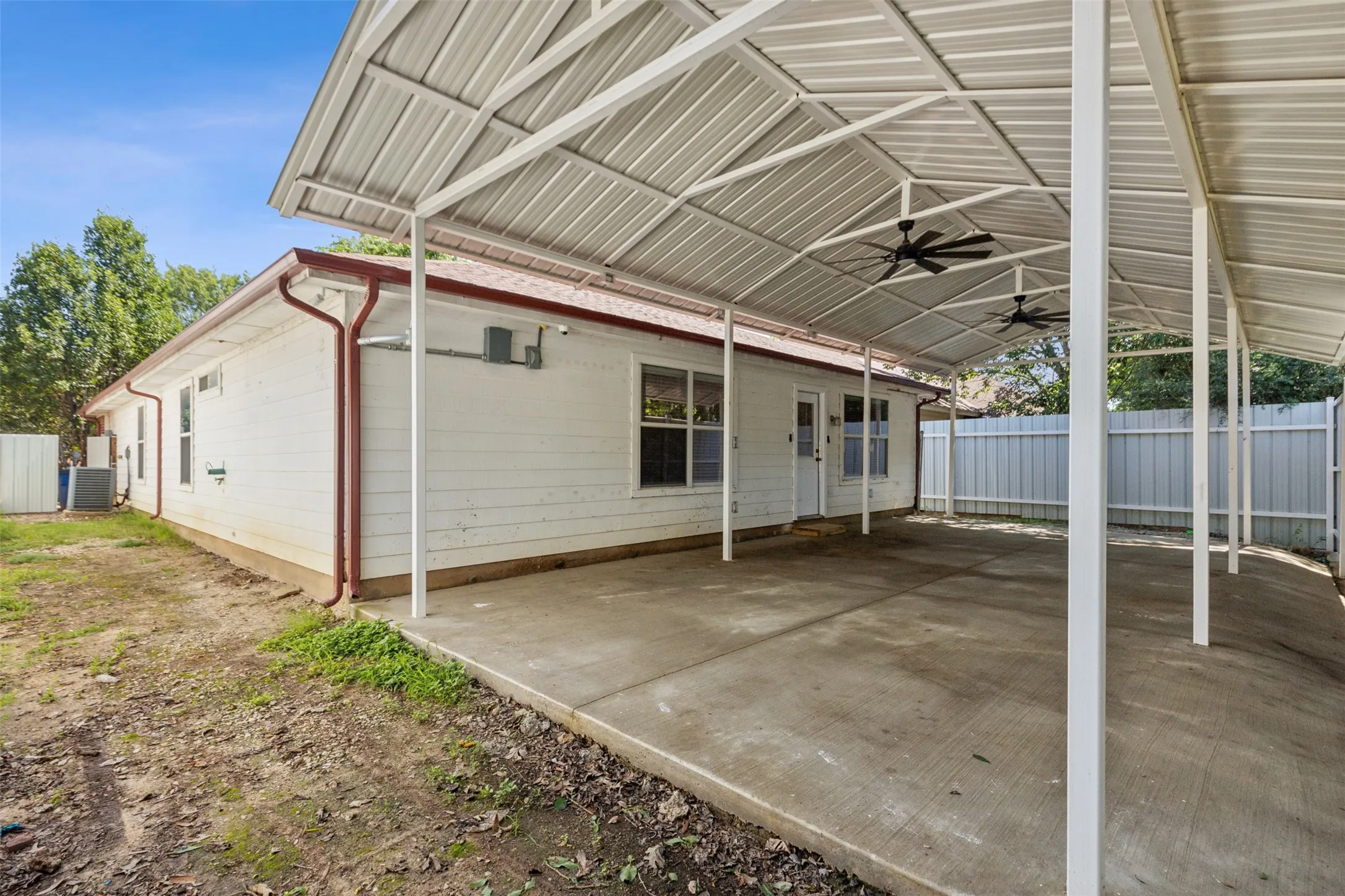 View of patio featuring ceiling fan and central AC unit