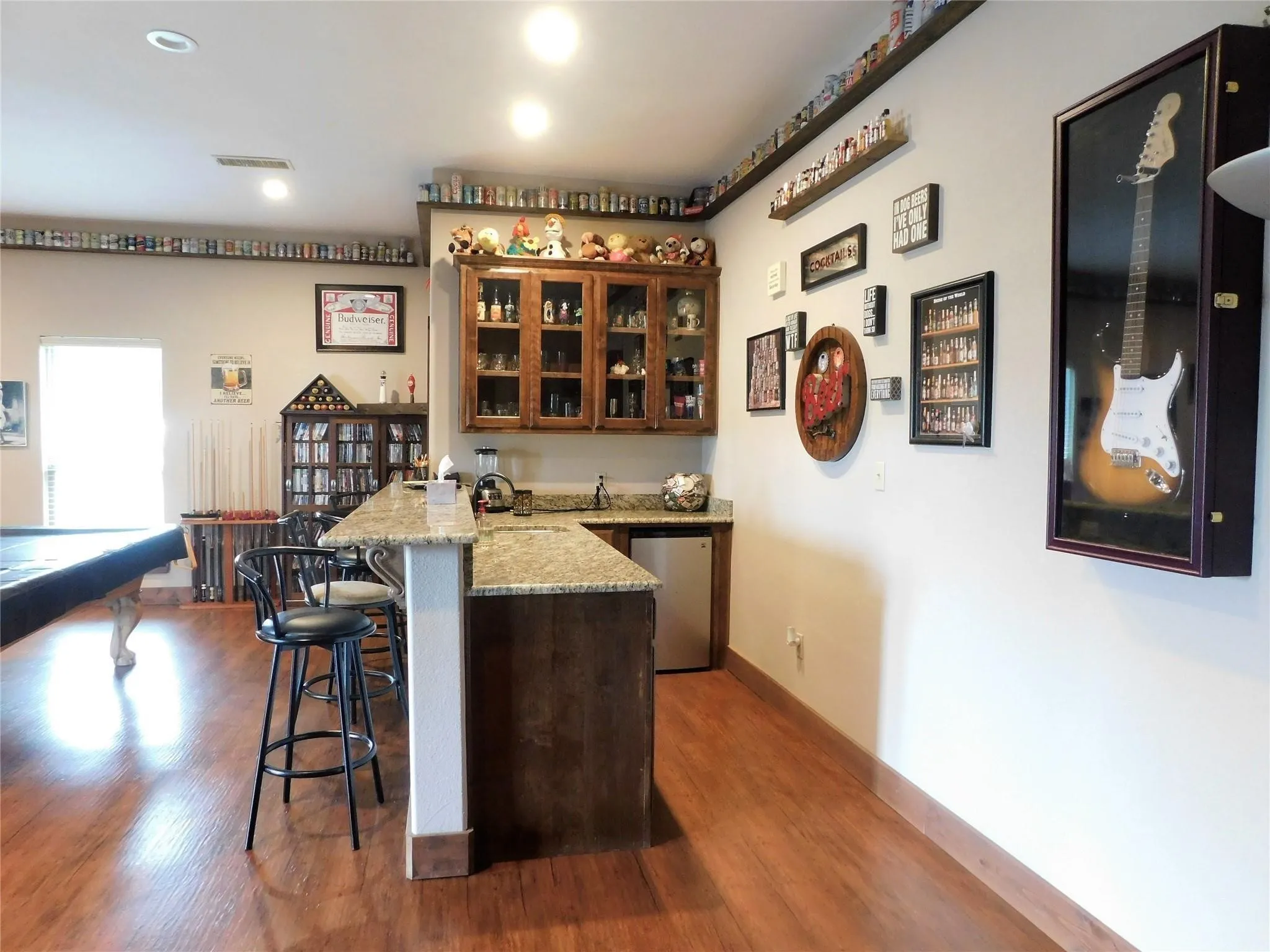 The Ultimate Beverage Station! Custom wet bar complete with a prep sink and ample storage