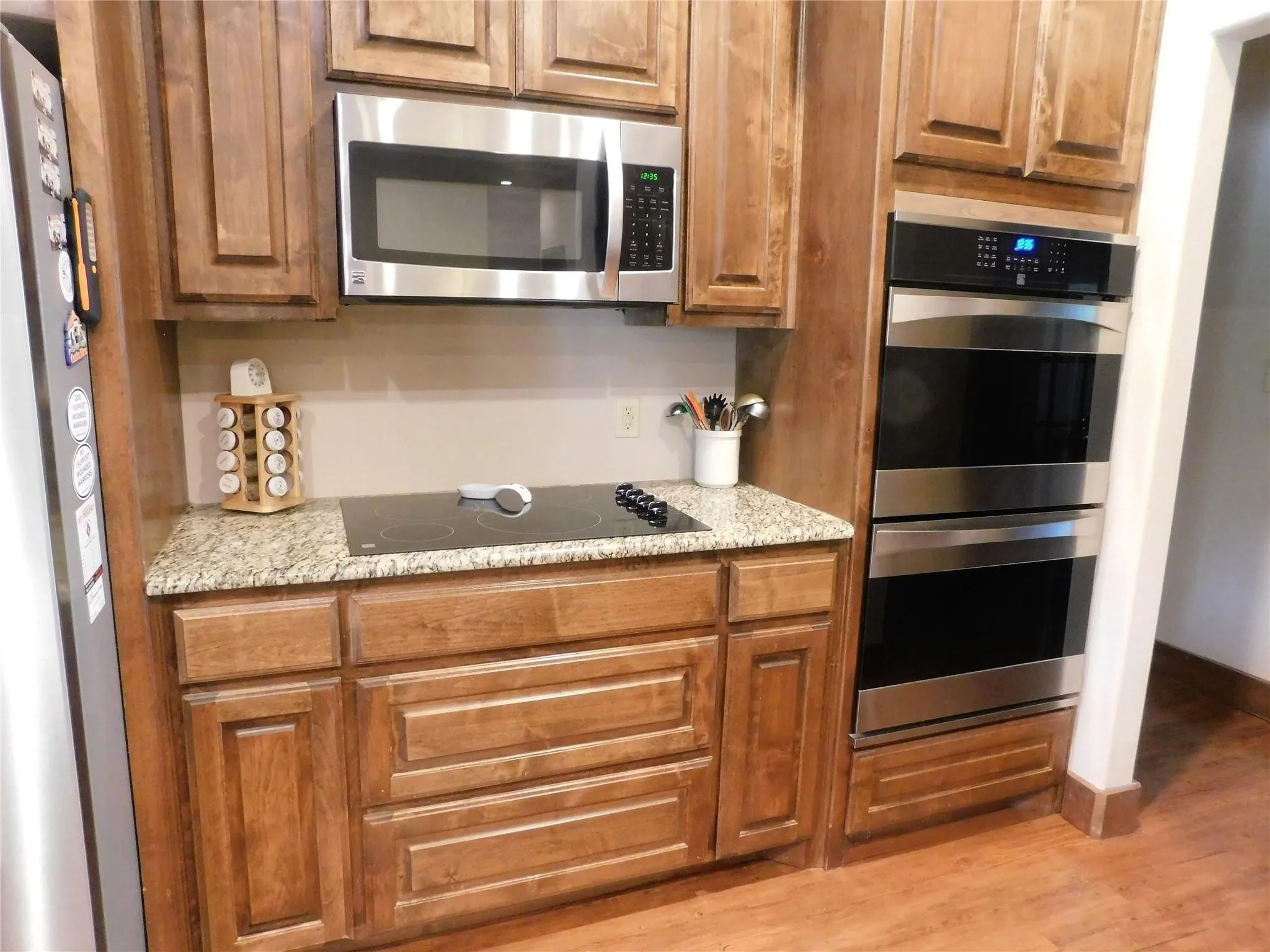 Custom wood cabinets and double ovens