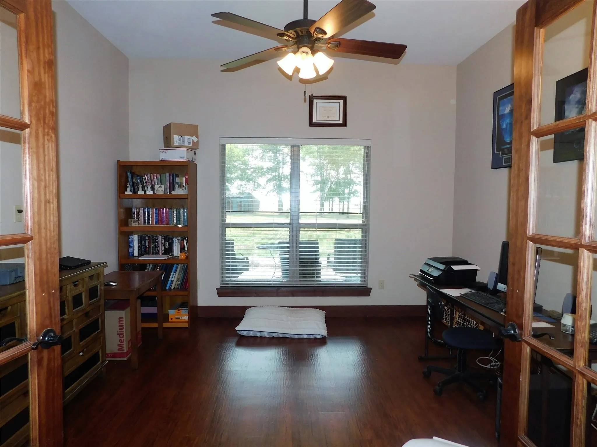 Office or study with double doors that open into a large room ready for you to work!