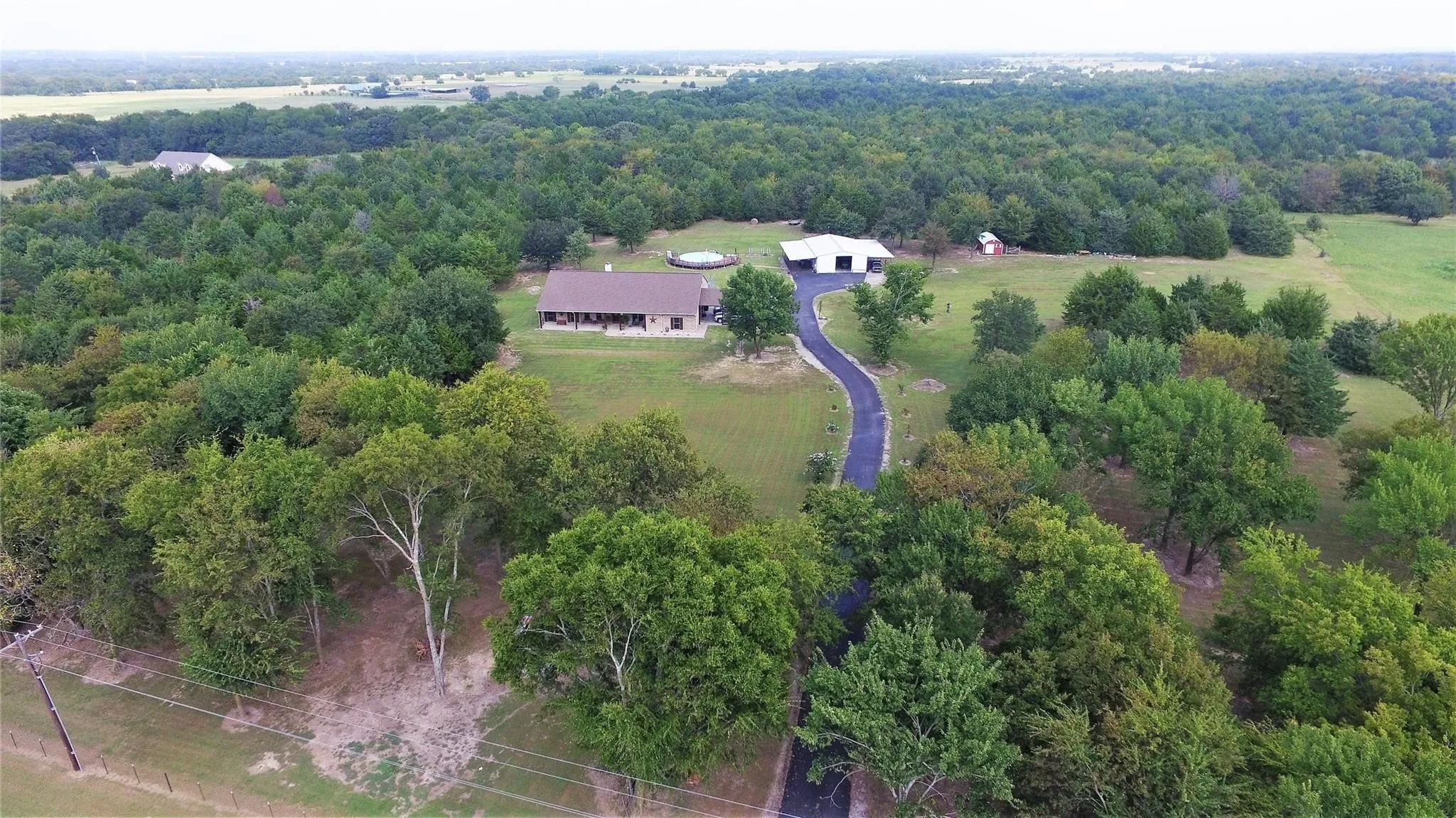 OFFERS MUCH SECLUSION But has some pasture!