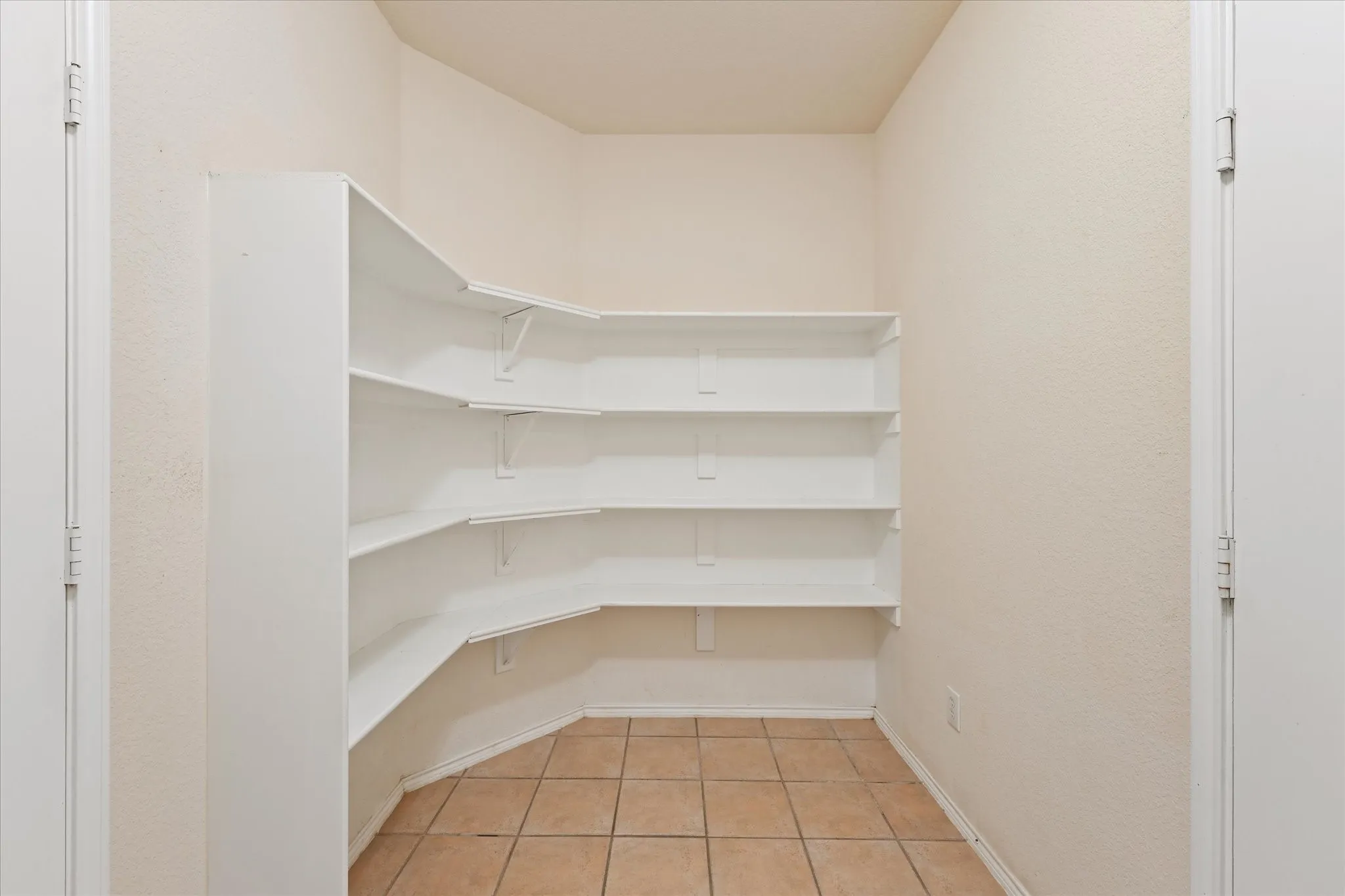 This multifunctional utility room/pantry are ideal for a busy family as they enter from the garage.