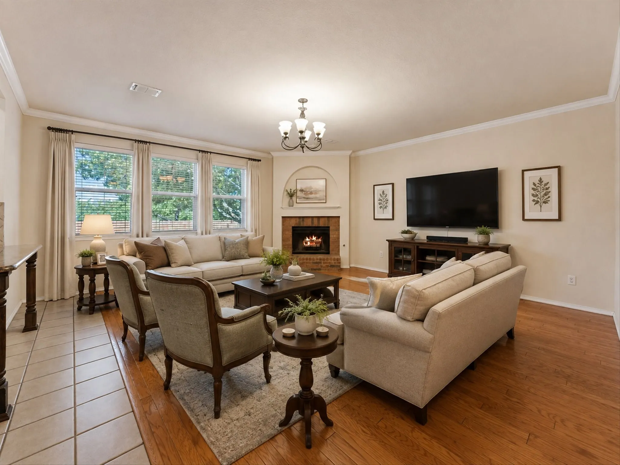 Corner brick fireplace, three large windows, wood-finish flooring with crown molding add warmth and character in this well appointed family room just off of the kitchen. *virtually staged
(virtually staged)