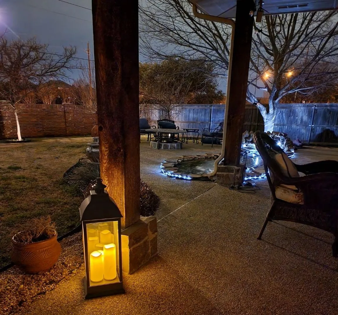 Covered patio with exposed aggregate concrete flooring