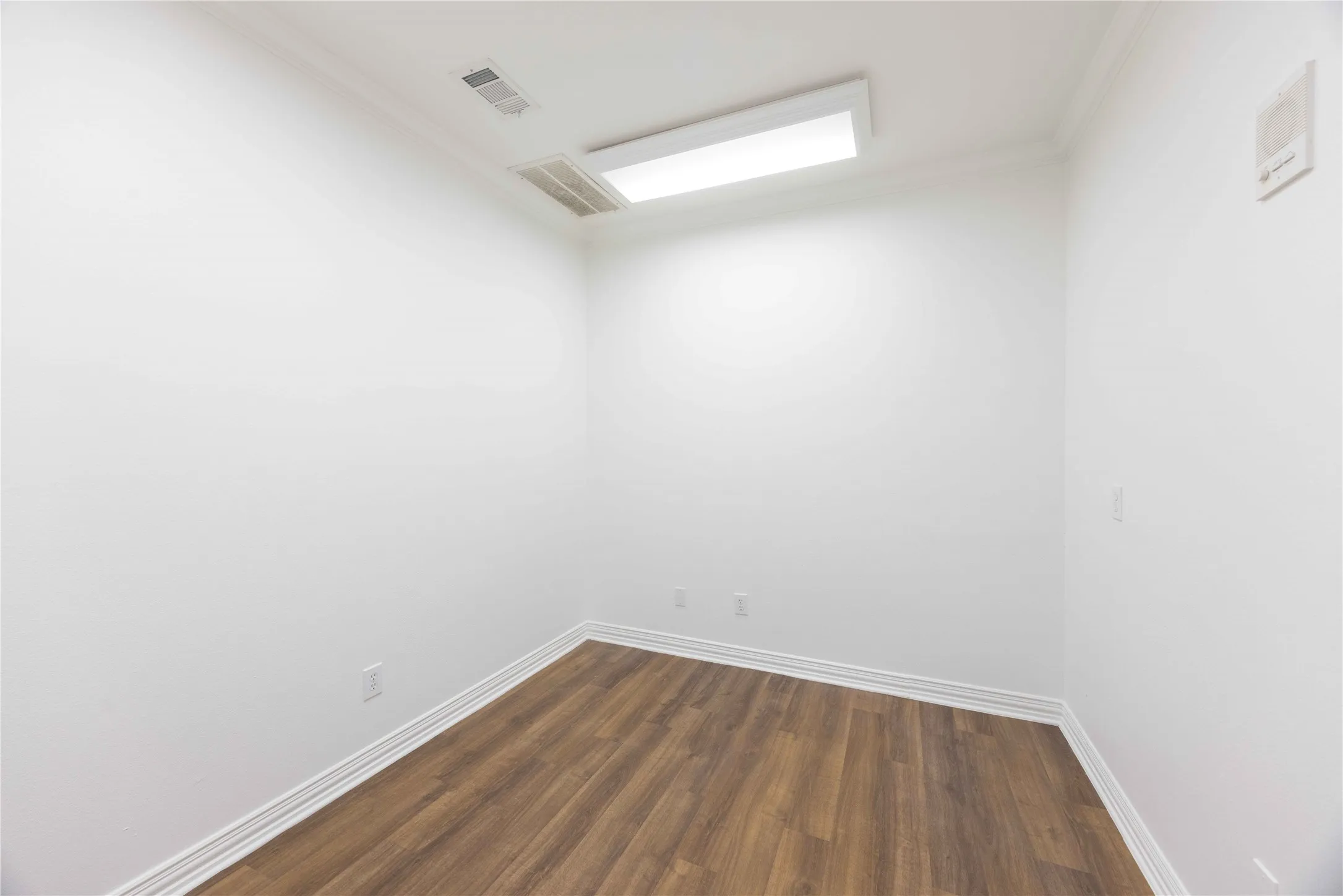 Wood-finish flooring with white trim