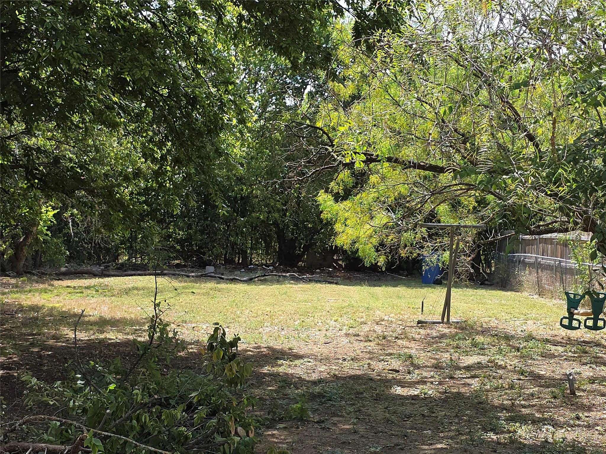 Expansive yard with mature trees