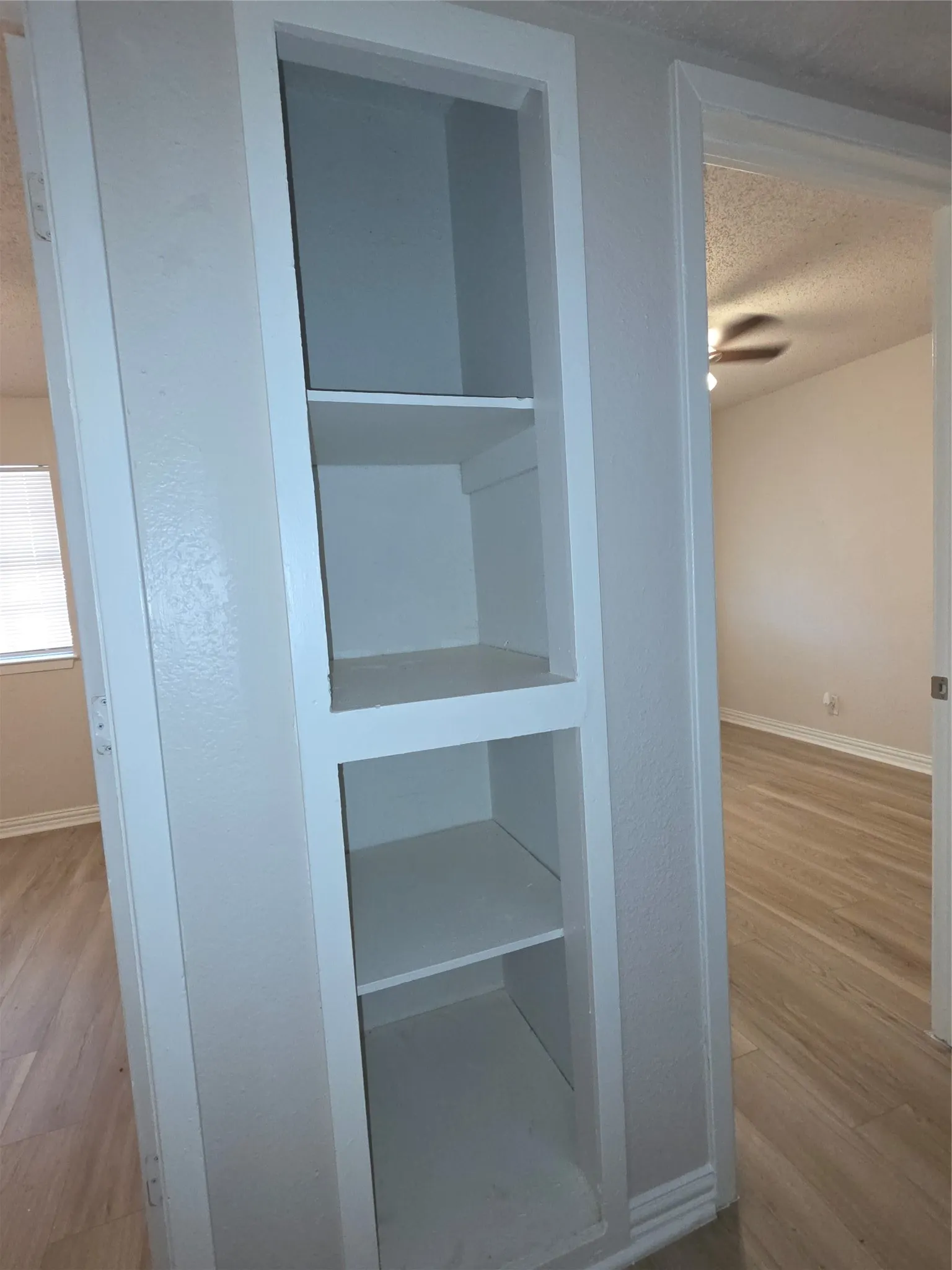 Built-in shelving with four levels of storage