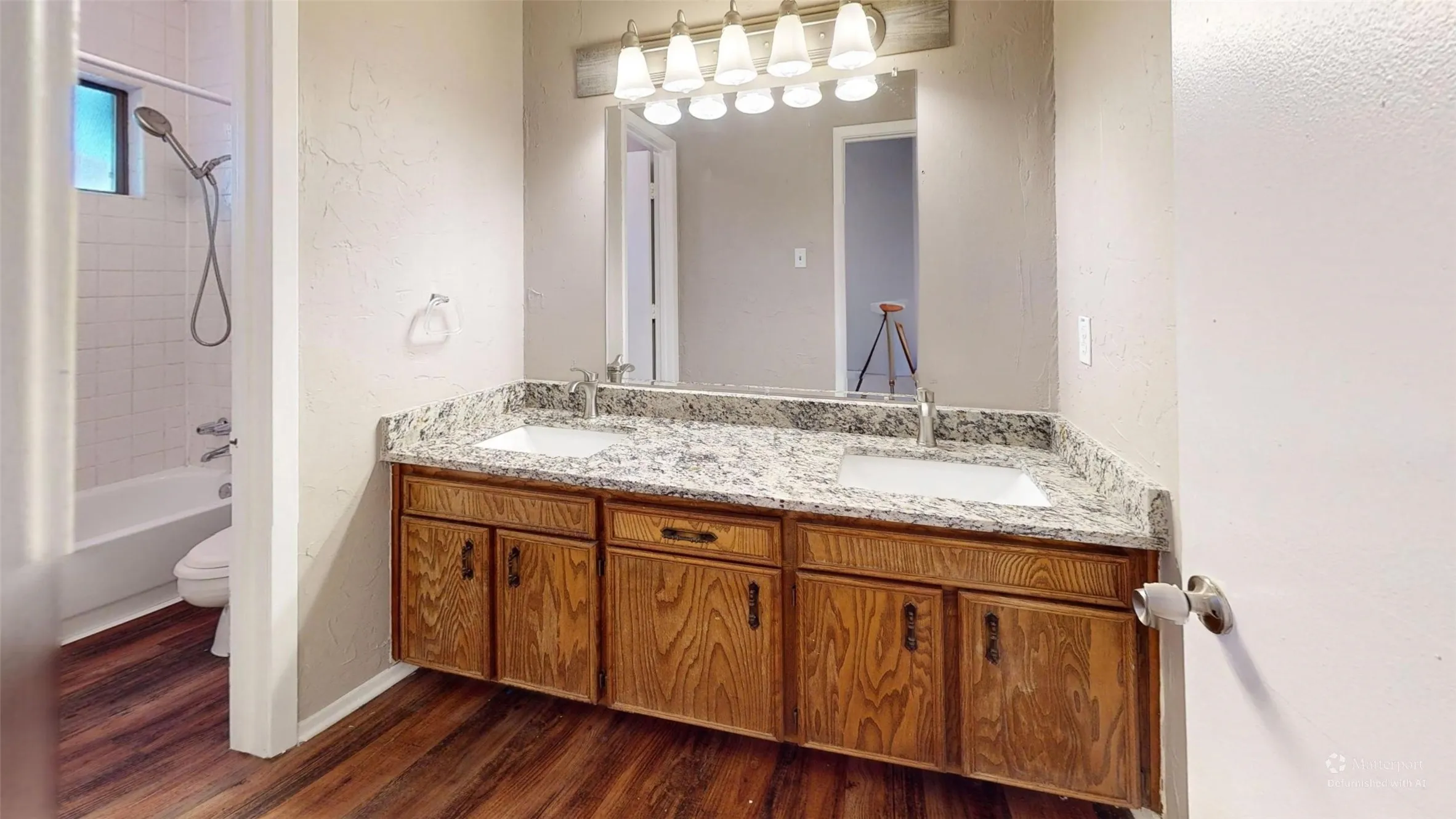 Wood-finish flooring throughout