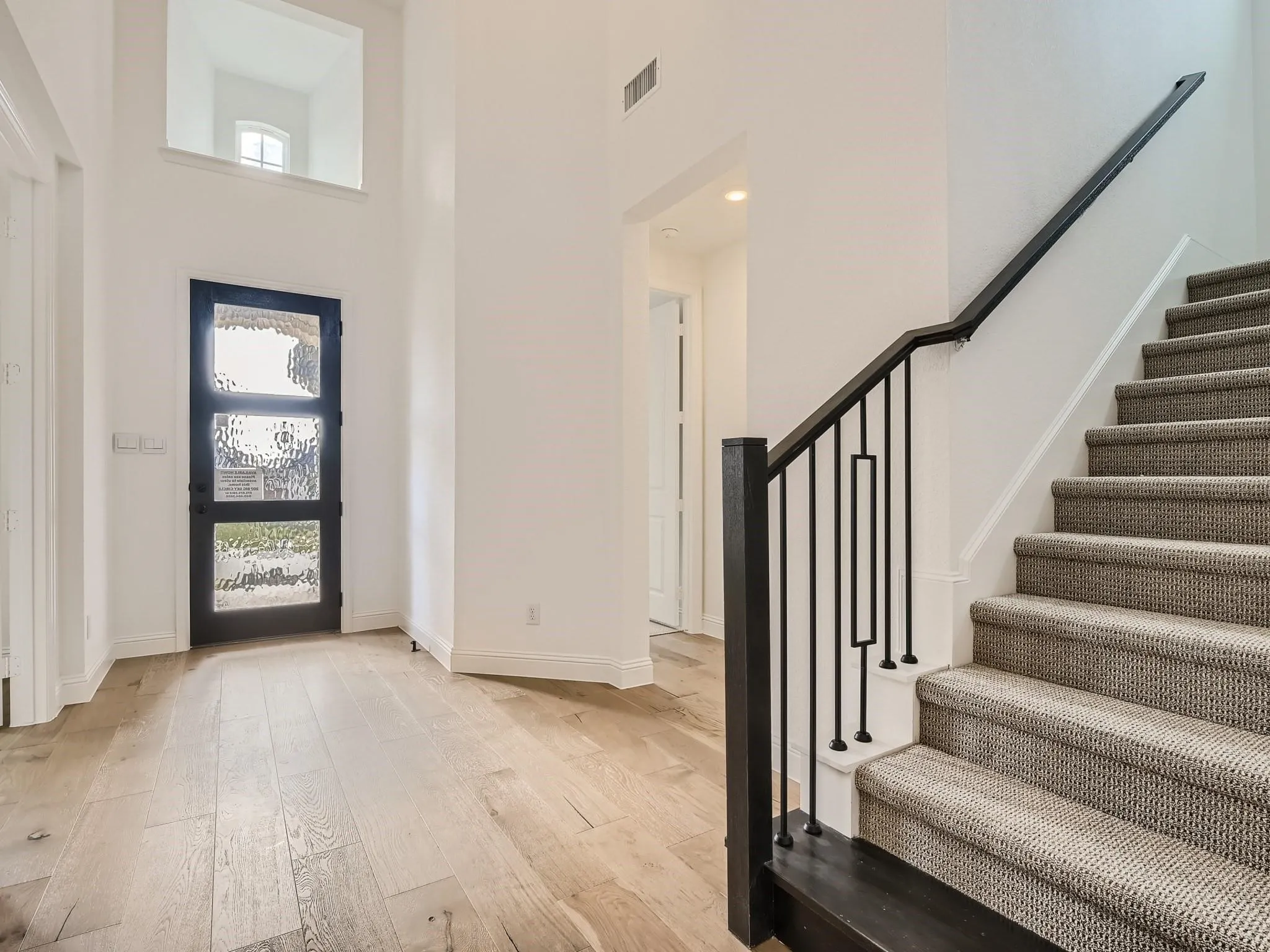 Foyer with wood floors