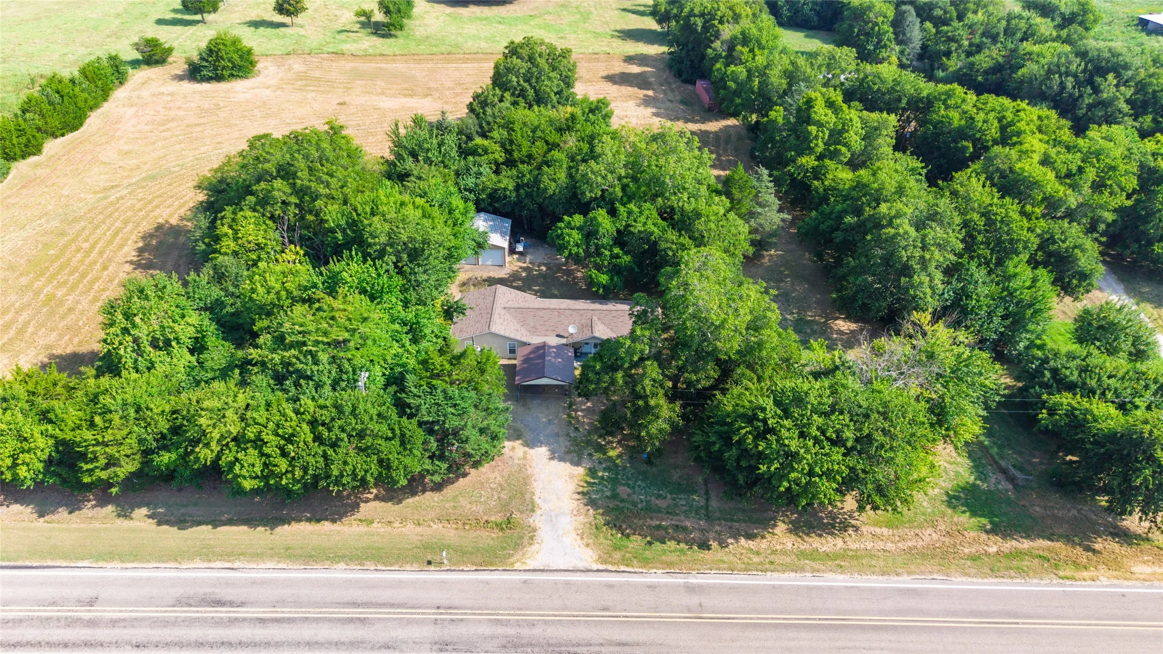 Additional contentThe aerial perspective does not provide sufficient detail of the primary residence or its architectural features to craft a compliant, factually grounded caption