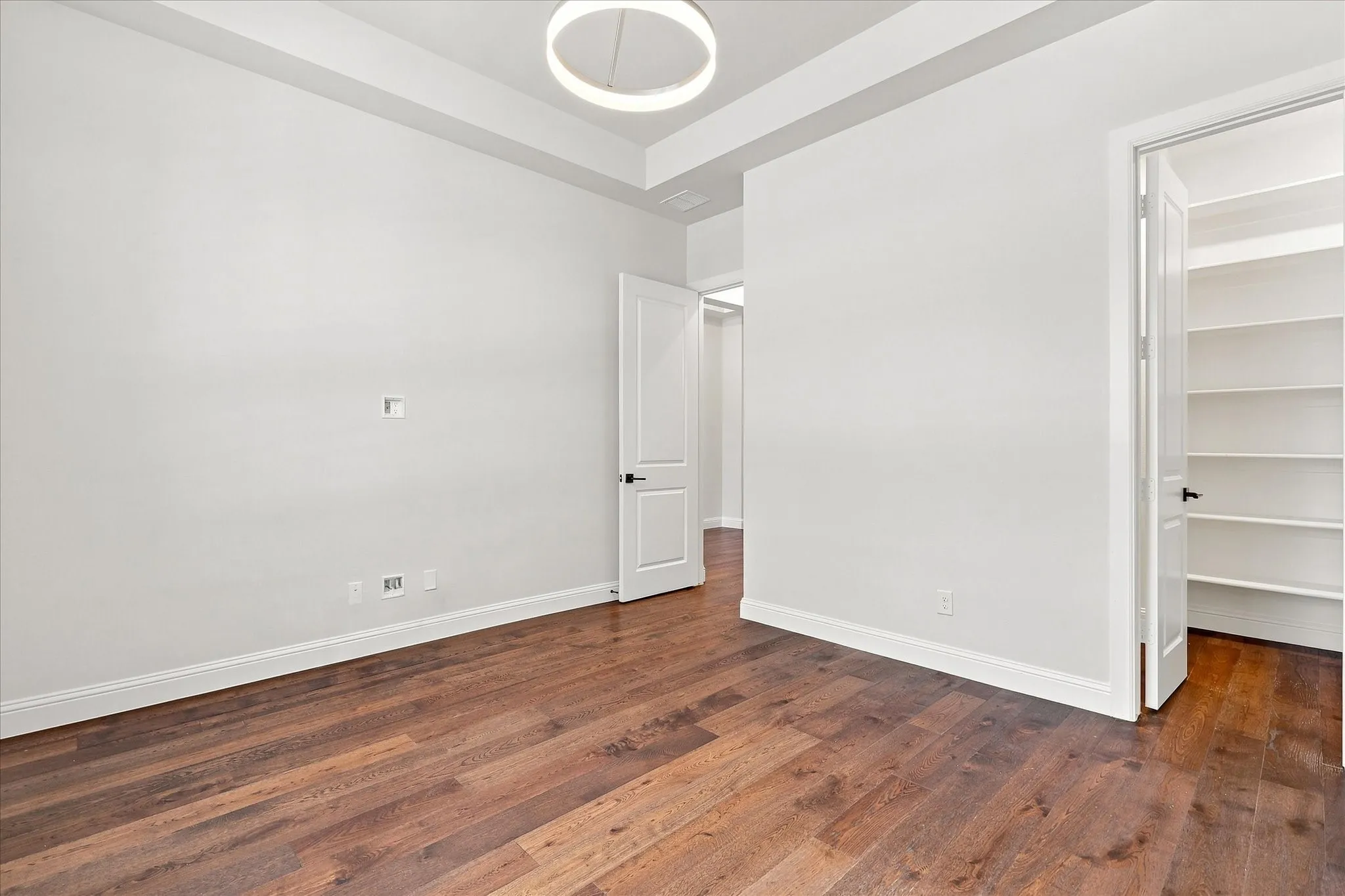 This space can be a dedicated home office, bedroom, craft room, living area.  The large walk-in closet has so many shelves for organized storage.