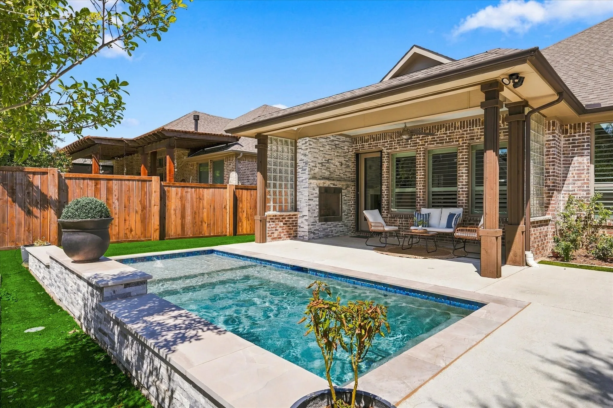 The water fall feature is beautiful to watch and helps keep the water cool.  The perimeter tile and pebble wall texture are pretty and provide a sturdy finish.