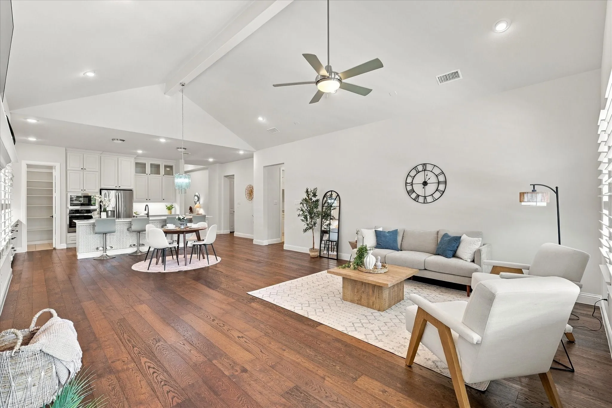 The vaulted ceiling in the living and dining areas create such a sense of space!  The proportions create a comfortable scale.