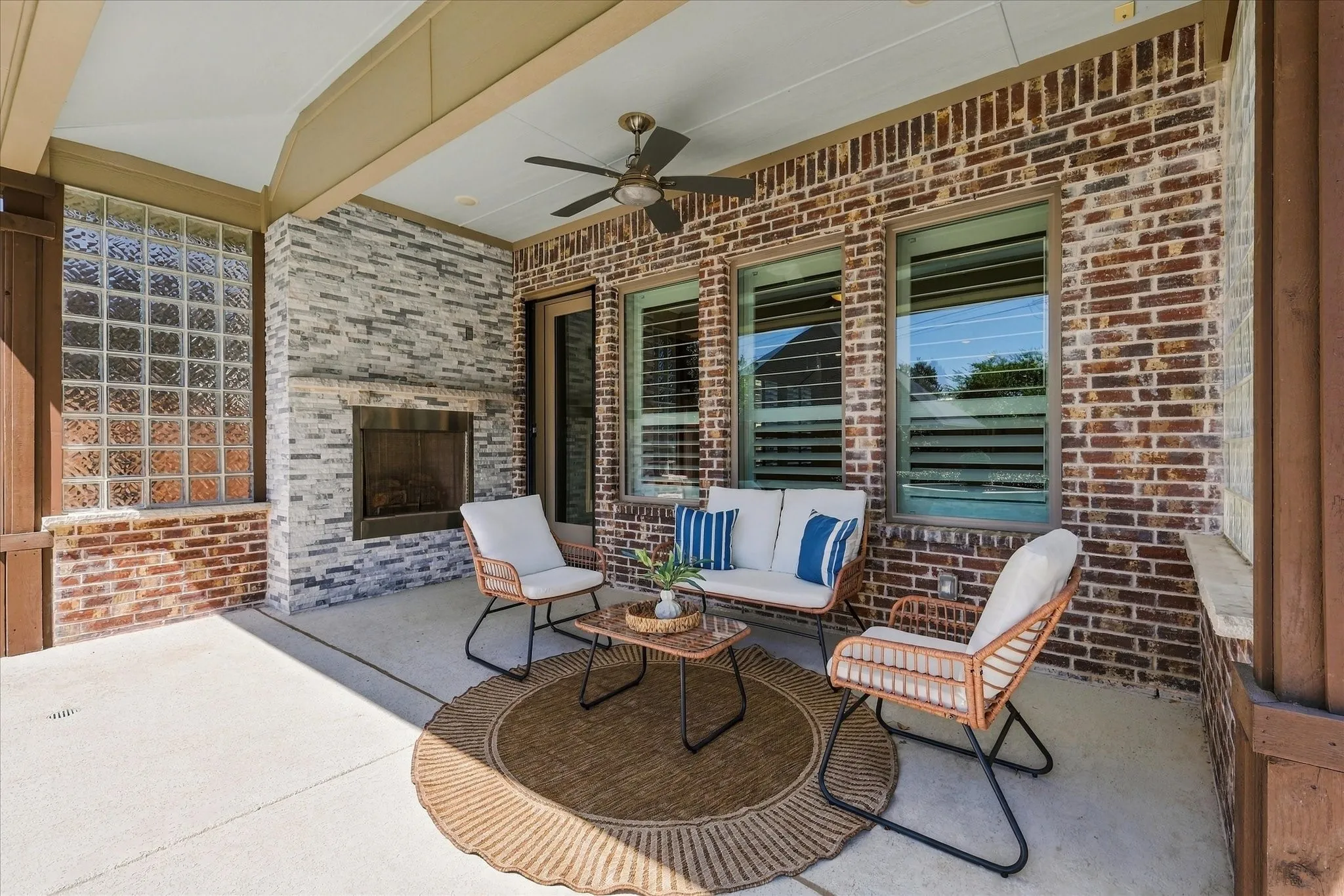There is nothing better than an outdoor living area in Highland Village!  The thoughtful design of this space with privacy, fireplace, and views is amazing.