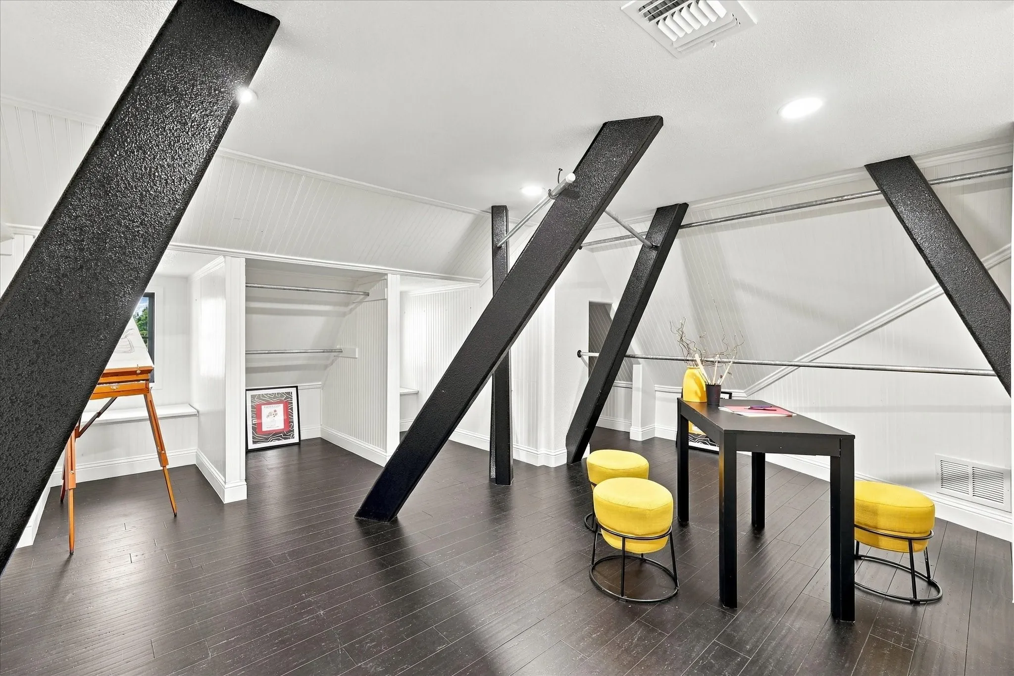 Such a surprise awaits at the top of the attic stairs!  Use this temperature controlled bonus room however you like!  it is finished out beautifully with wood floors and beadboard siding
