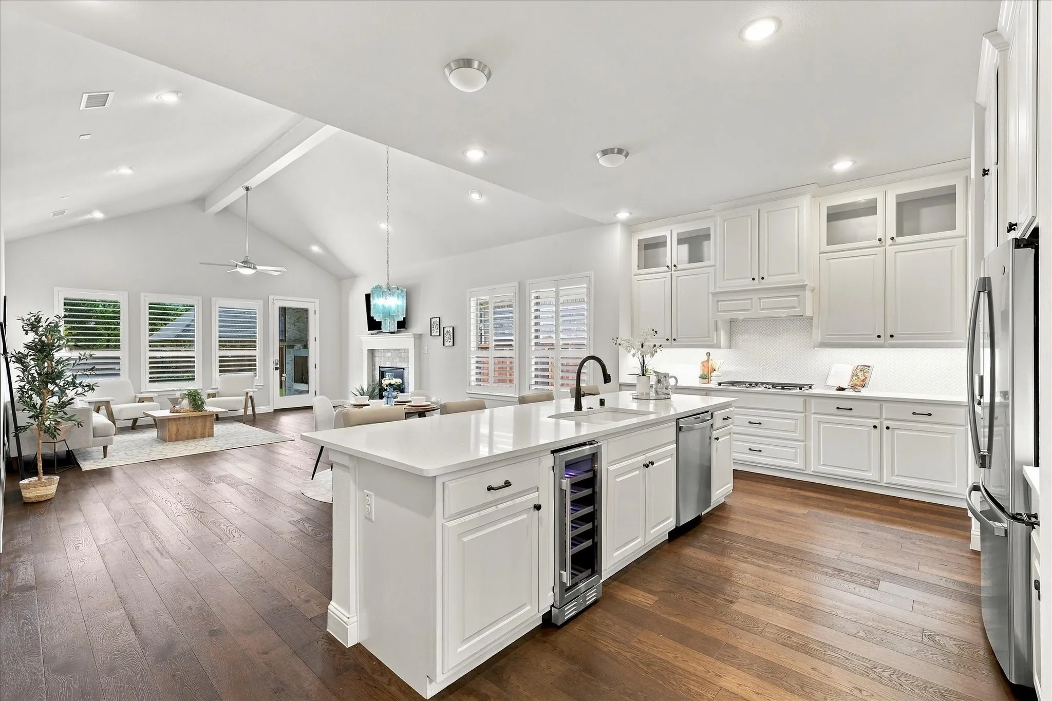 LED lights provide great general illumination and undercounter lights provide perfect task lighting.  Note the beverage refrigerator that conveys with the house.