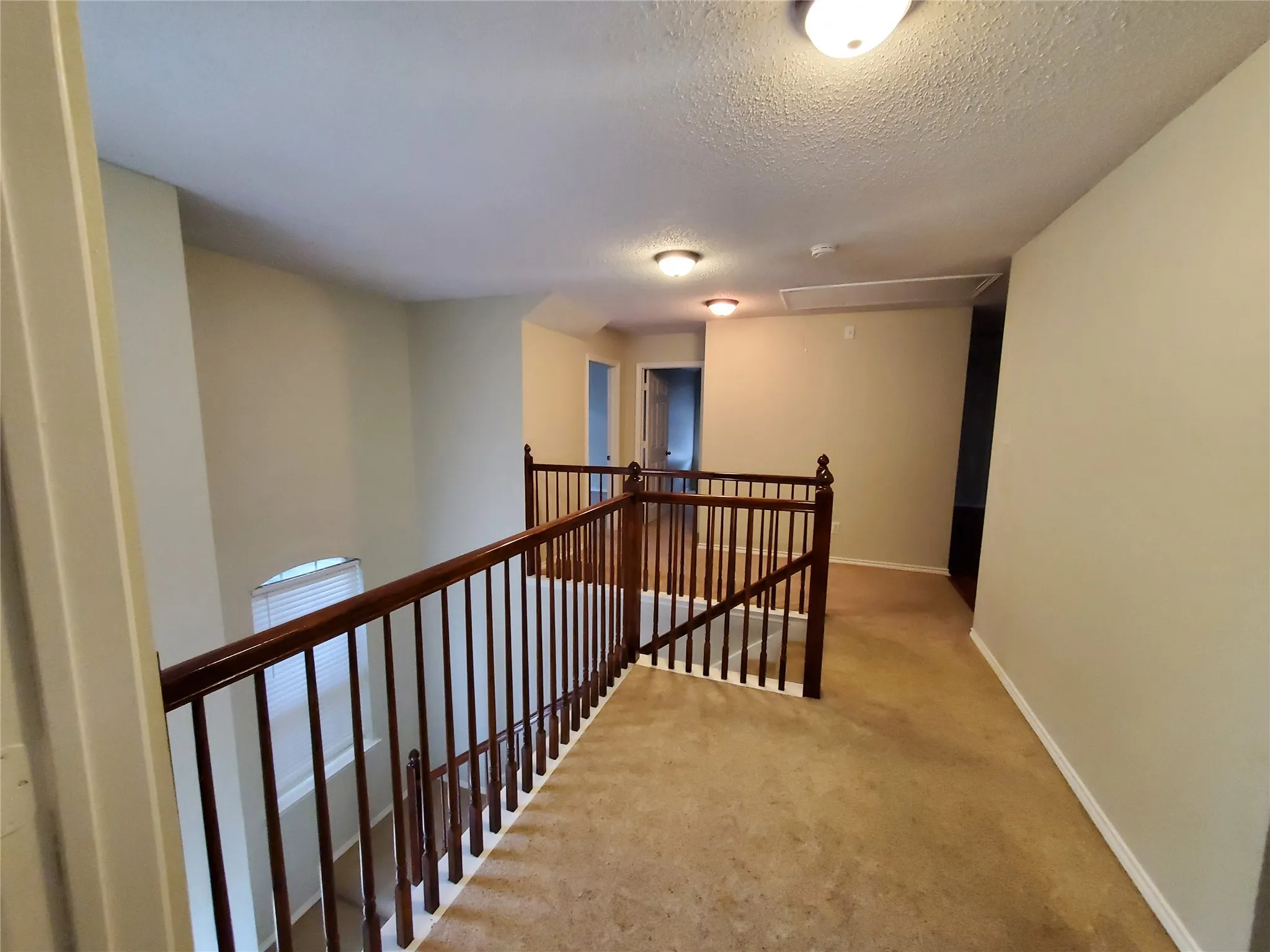 Looking from master to secondary bedrooms upstairs