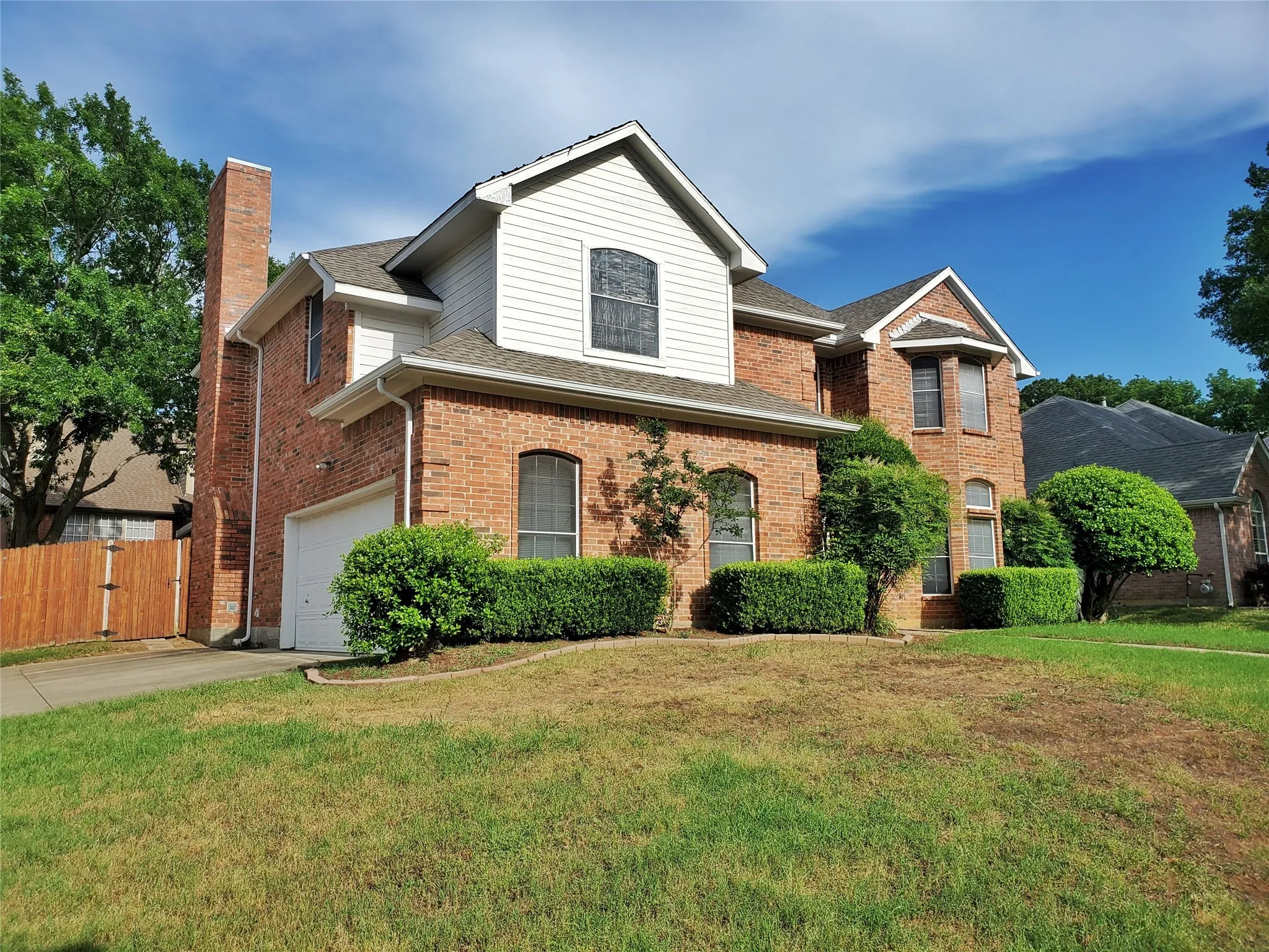 This home is situated on a gorgeous large corner lot