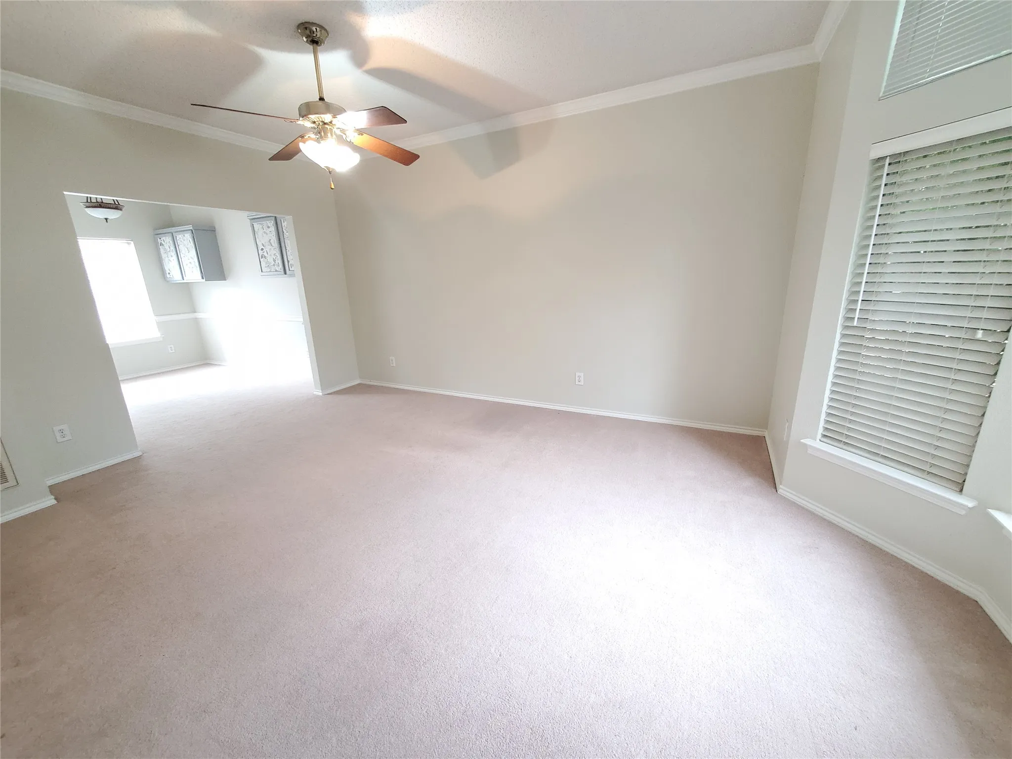 Livingroom 1 as you enter the home.   (PHOTOS TAKEN PRIOR TO TENANT, CURRENTLY OCCUPIED)Connects to formal dining (PHOTOS TAKEN PRIOR TO TENANT, CURRENTLY OCCUPIED)