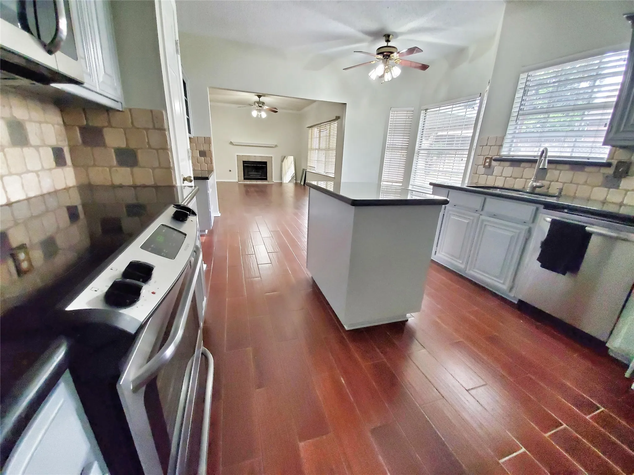 Kitchen looking form formal dining room to living 2.  (PHOTOS TAKEN PRIOR TO TENANT, CURRENTLY OCCUPIED)