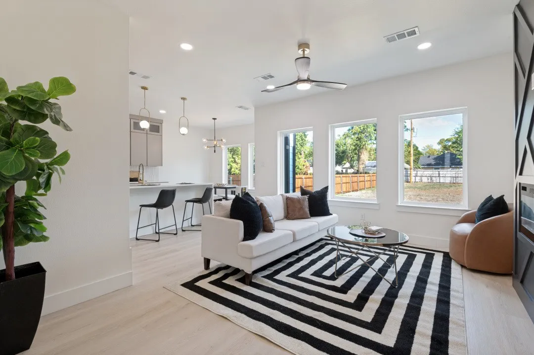Recessed lighting, wood-finish flooring, and multiple windows