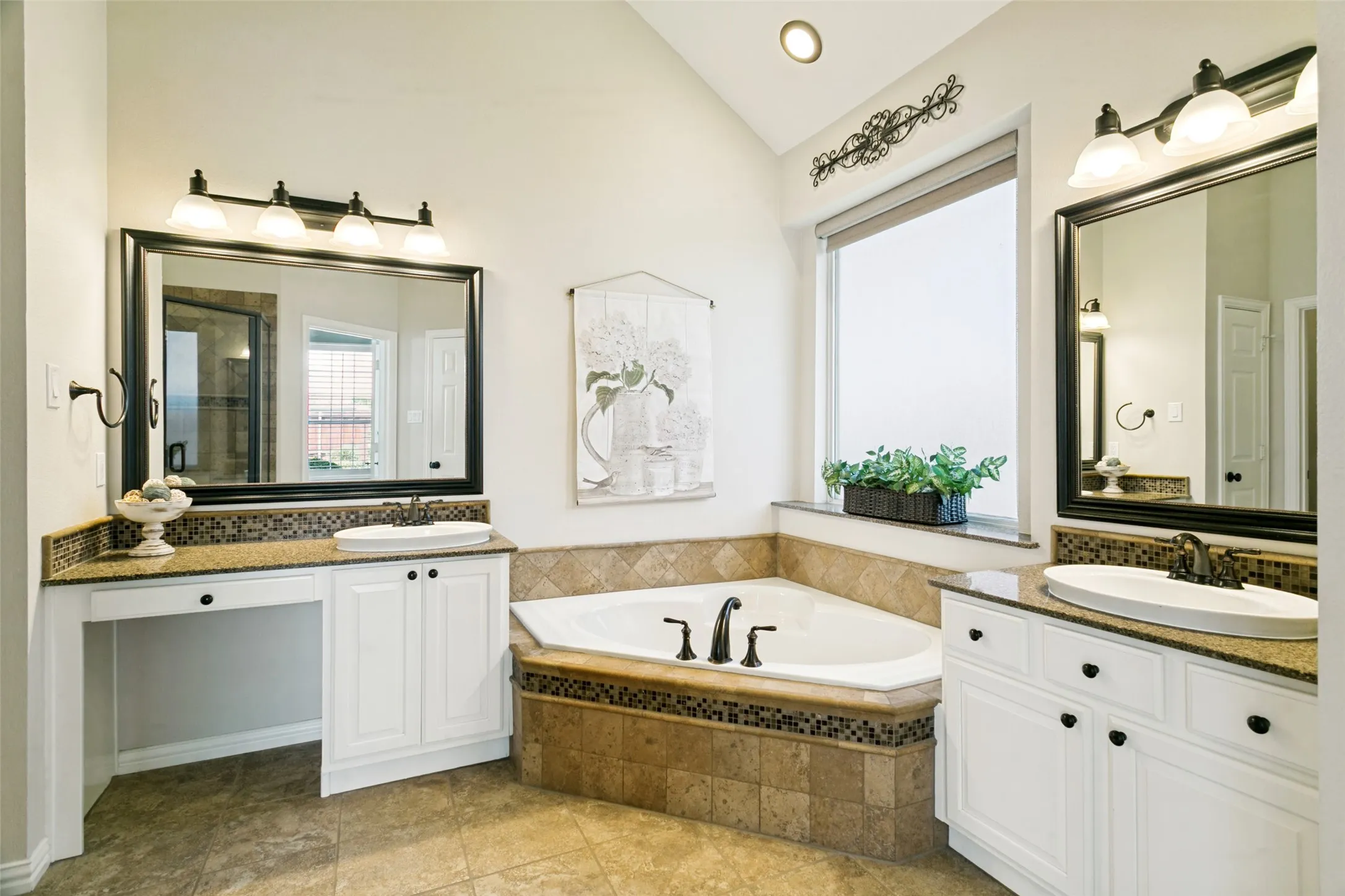 Dual vanities in primary bedroom
