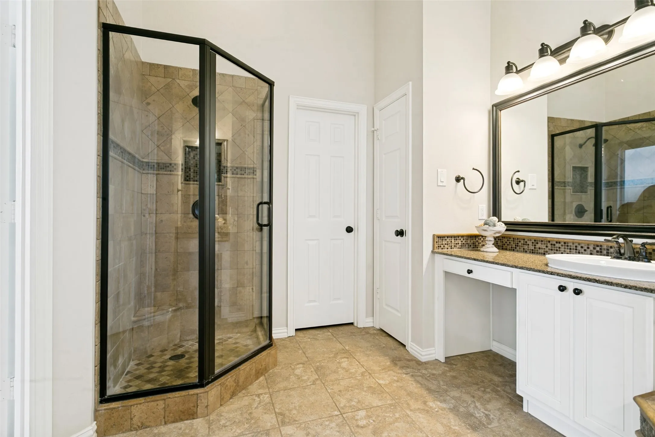 Separate shower and knee hole in vanity