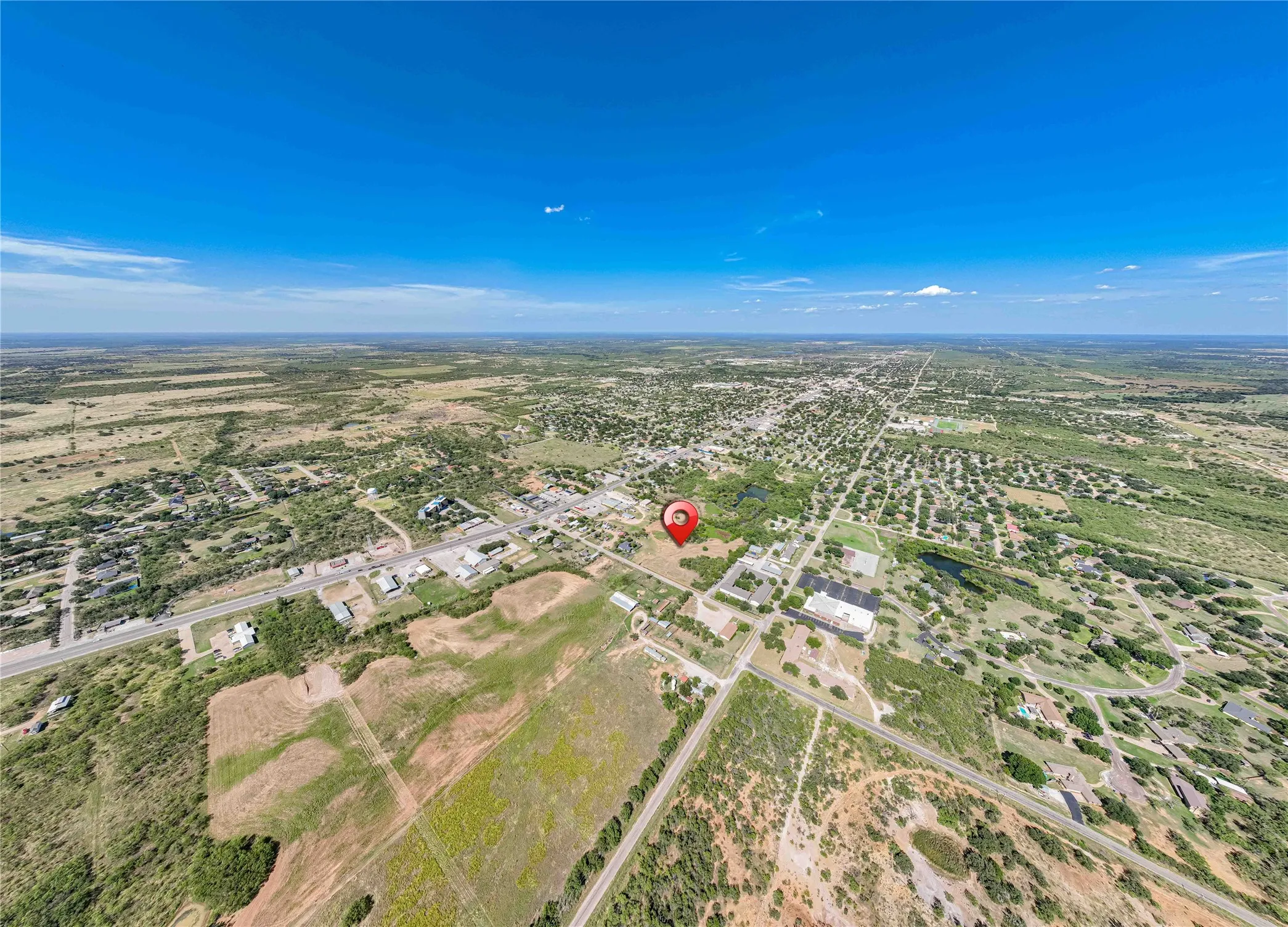 Additional contentThe aerial perspective does not provide sufficient detail of specific property features, materials, finishes, or architectural elements necessary for a compliant and marketable caption