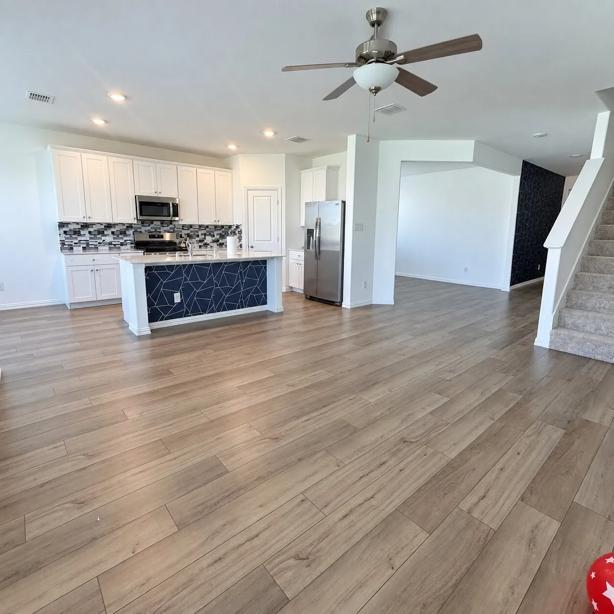 Wood-finish flooring throughout the main level
