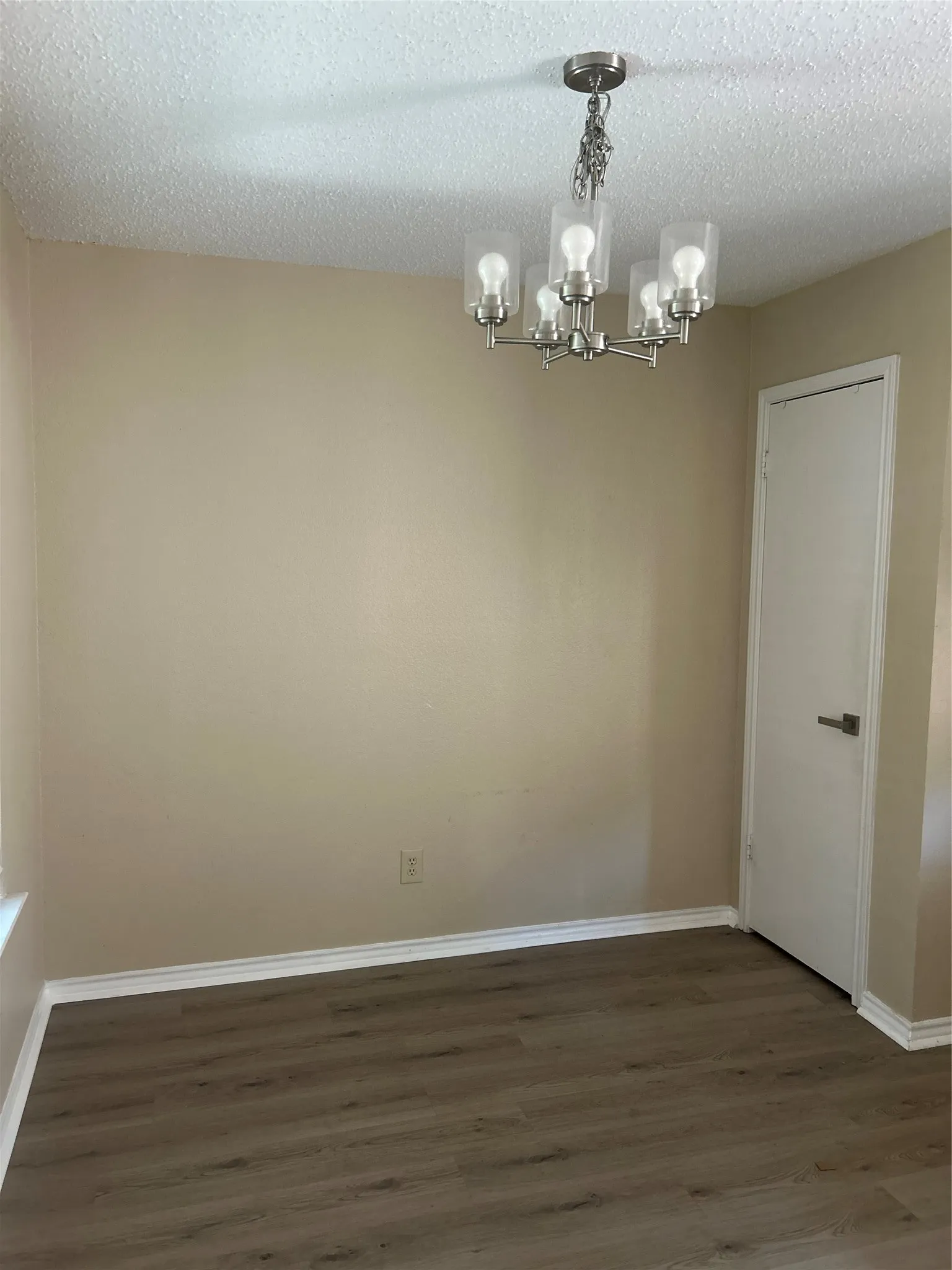 Eat-in Kitchen with Decorative Lighting