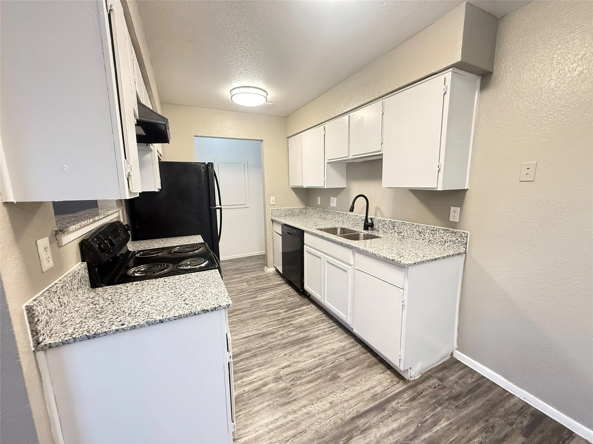 Brand new granite counters in kitchen and bathroom. This is the actual unit.