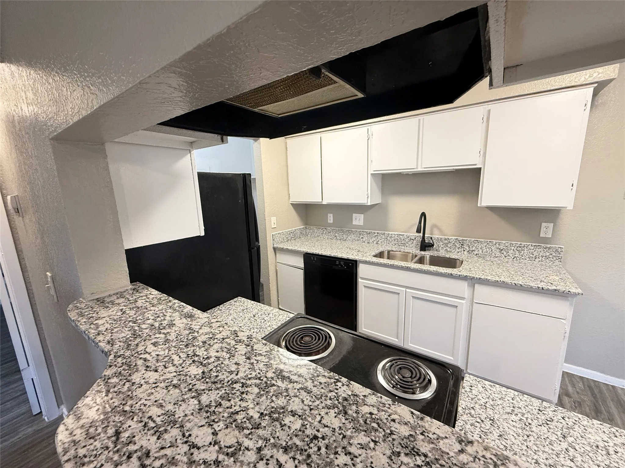 Brand new granite counters in kitchen and bathroom. This is the actual unit.