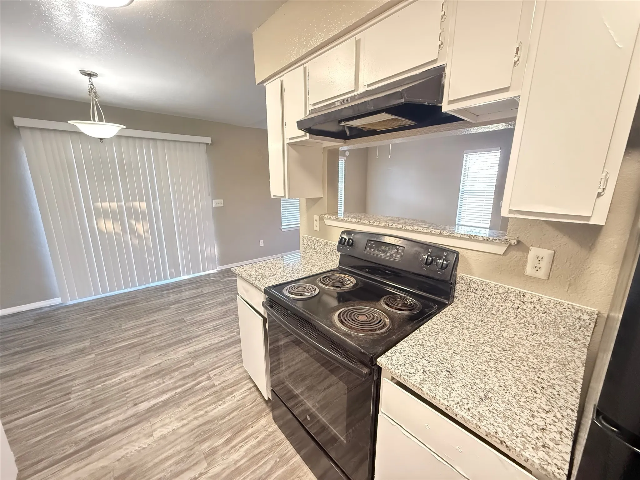 Brand new granite counters in kitchen and bathroom. This is the actual unit.